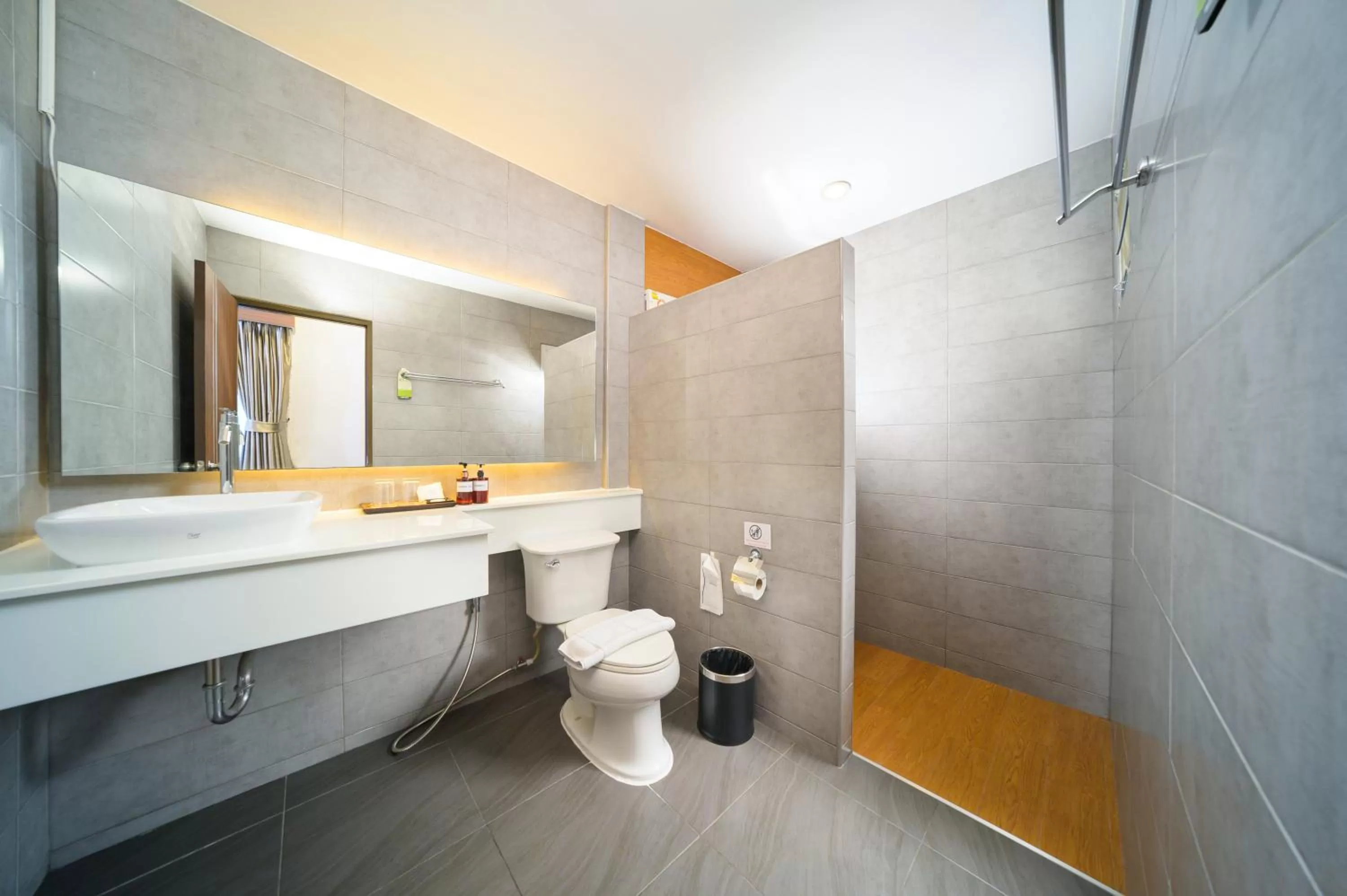 Bathroom in The Wing Lanna Hotel