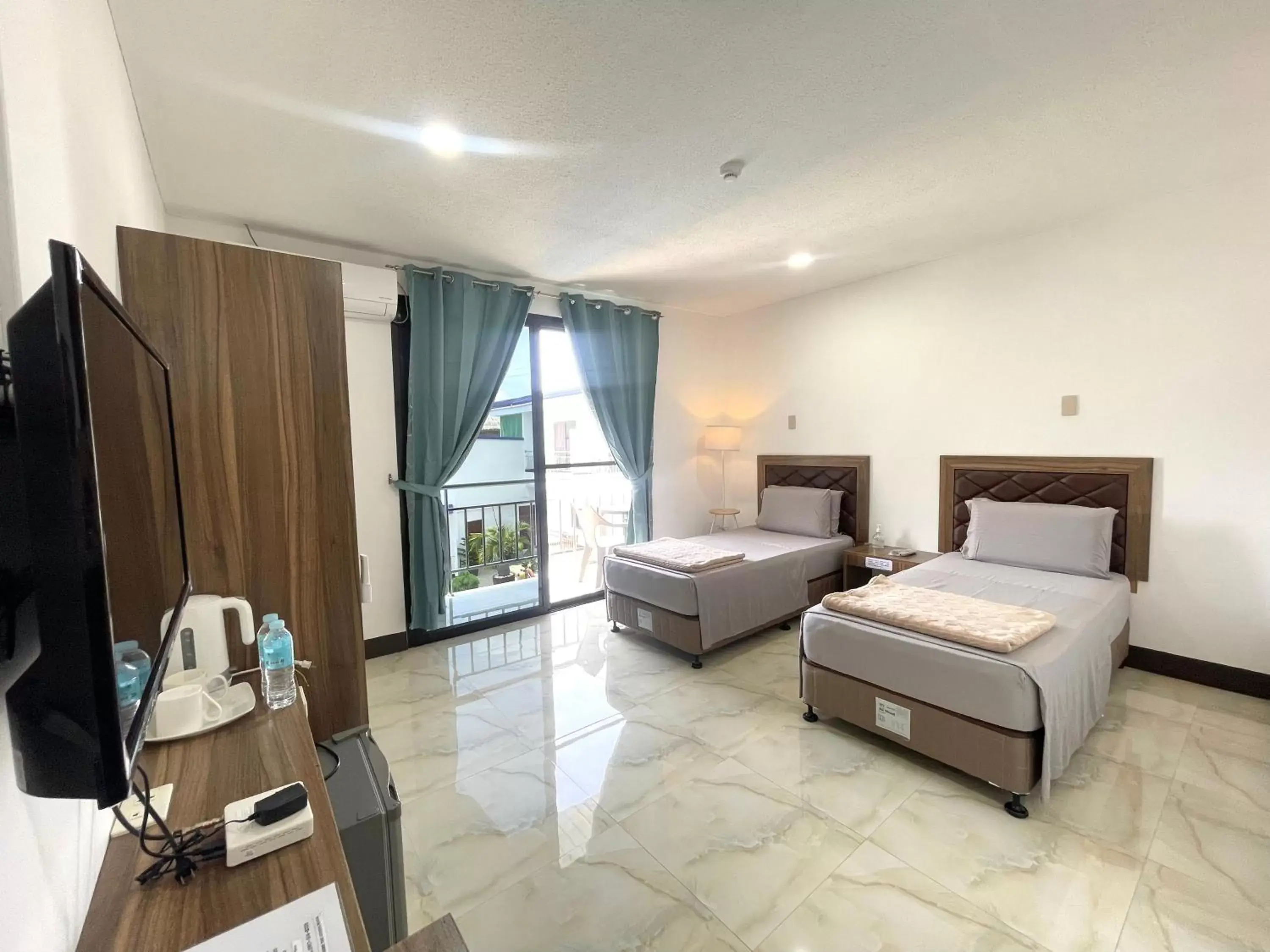 Coffee/tea facilities, Bed in MGH Alona Resort Coffee/tea facilities, Bed in MGH Alona Resort