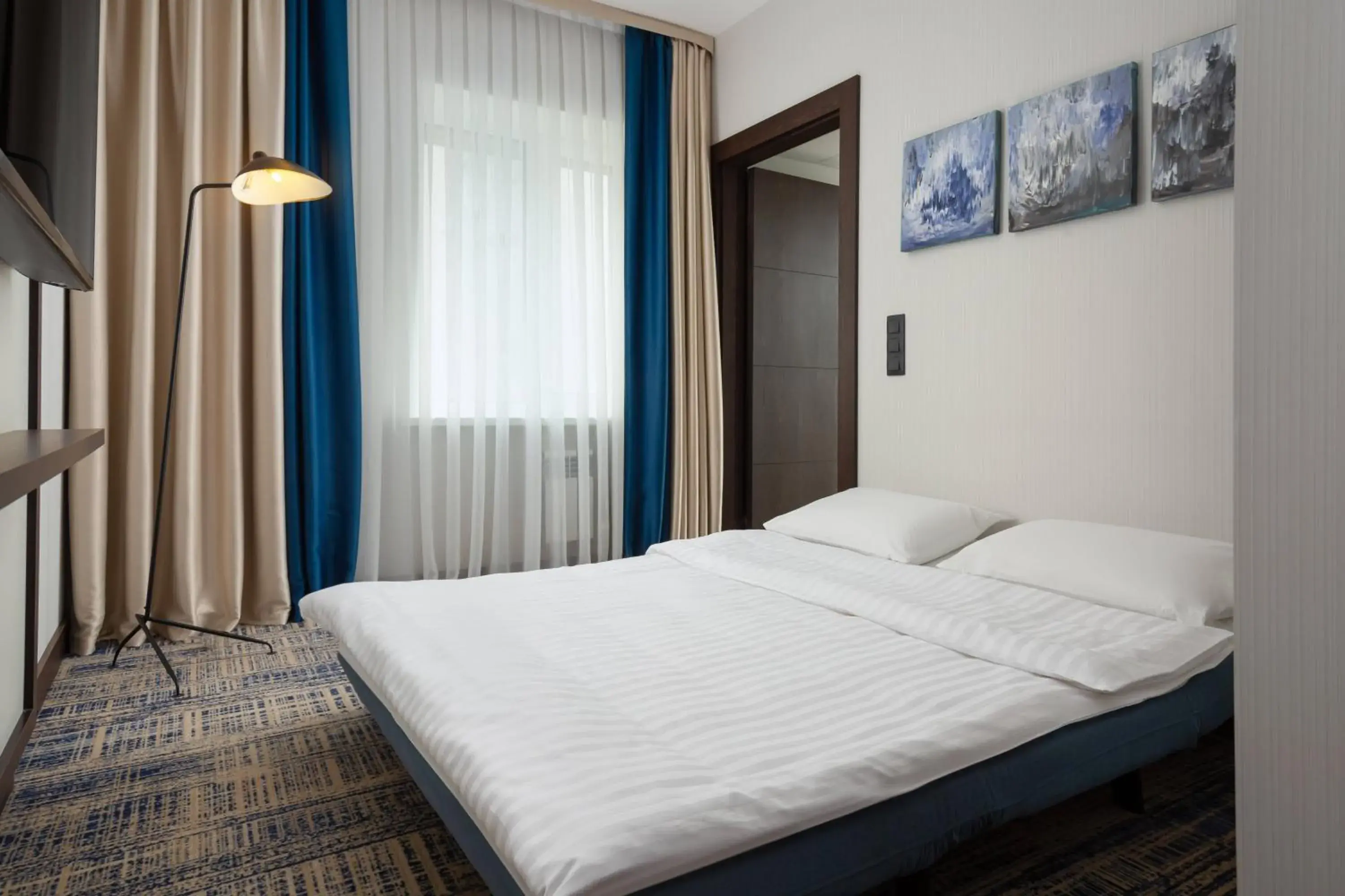 Bedroom, Bed in Courtyard by Marriott Tashkent