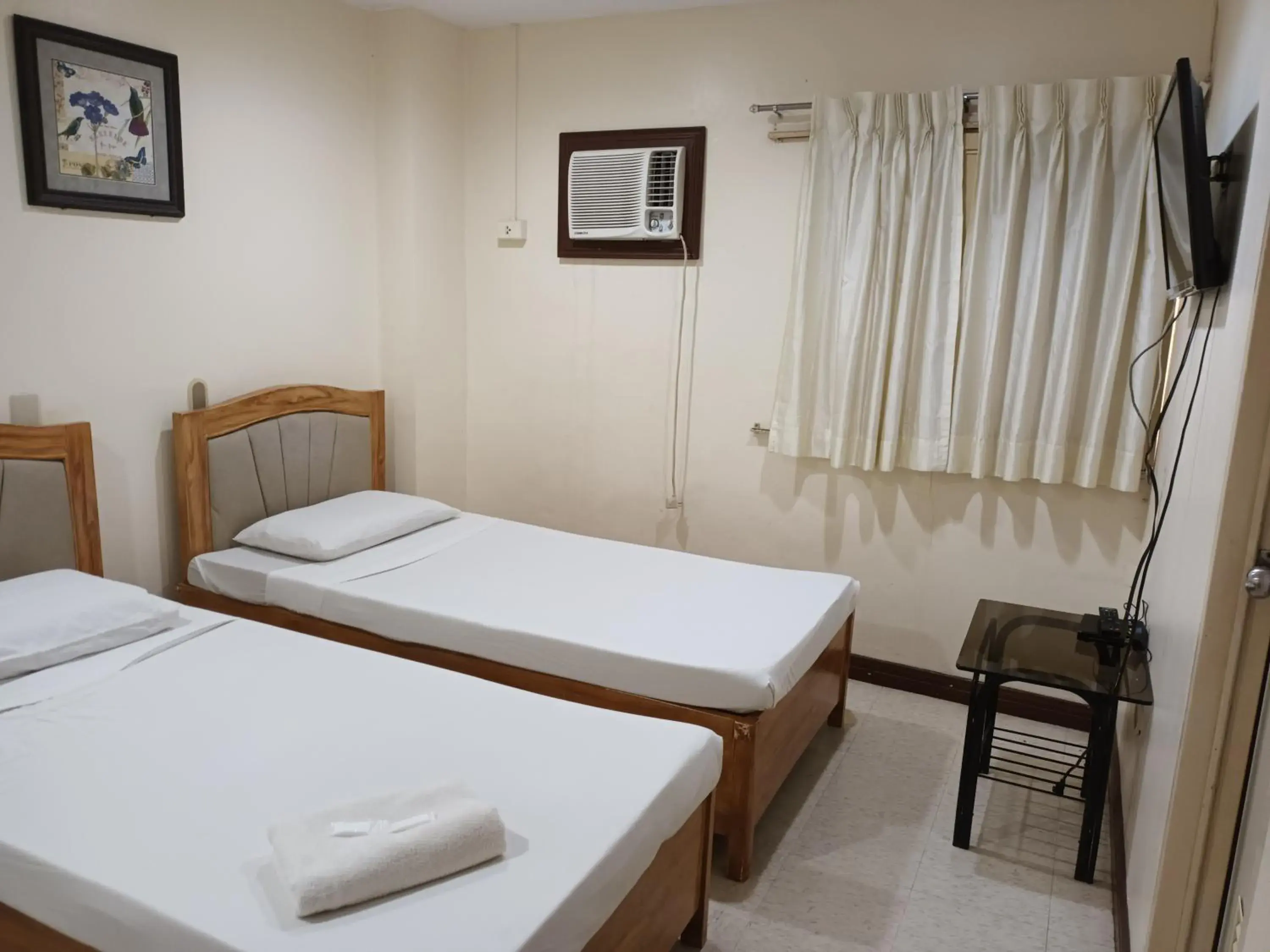 Bed in Mactan Pension House