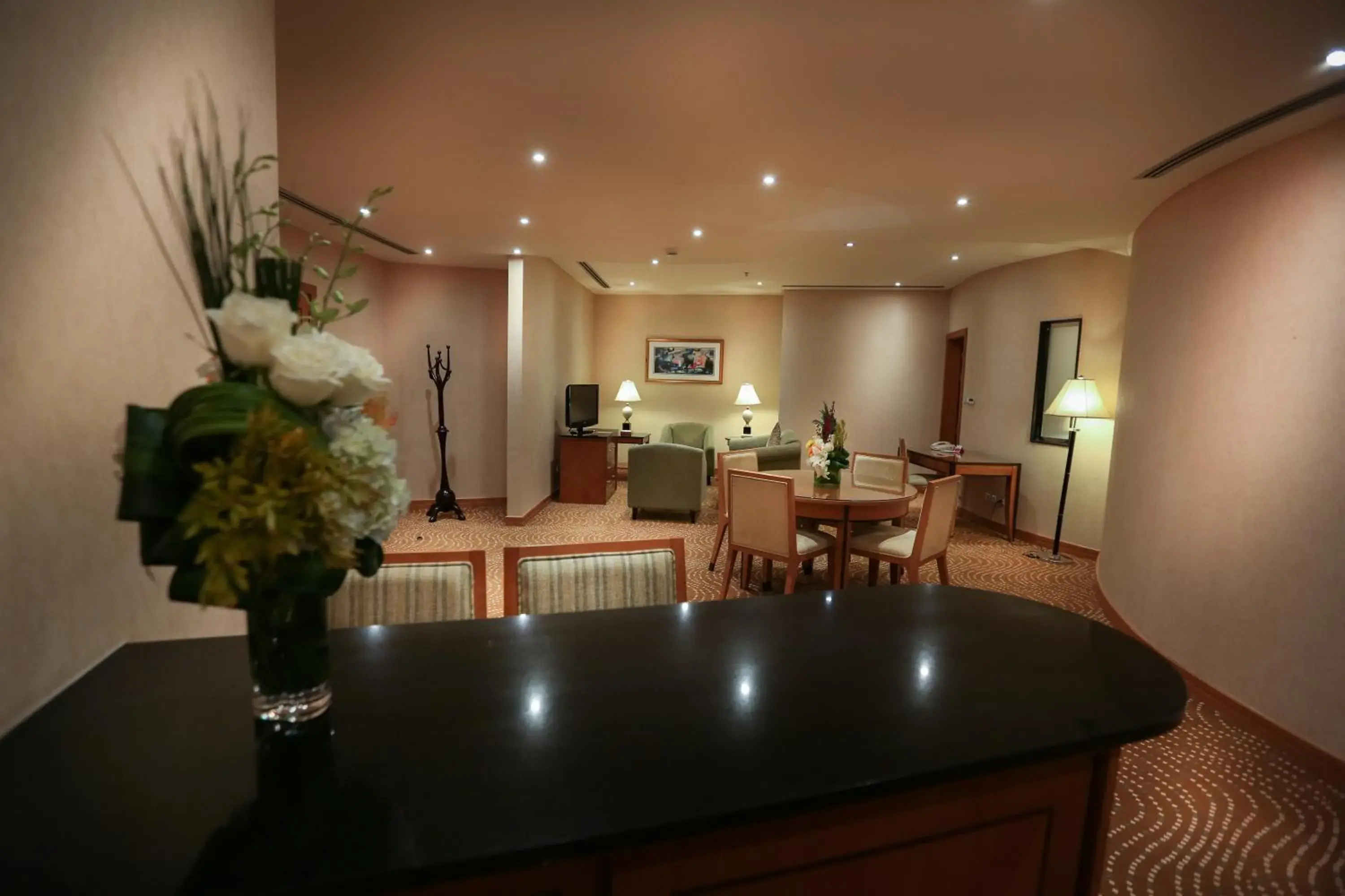 Living room in Eastyard Khobar Hotel - Formerly Ramada by Wyndham Khobar Living room in Eastyard Khobar Hotel - Formerly Ramada by Wyndham Khobar