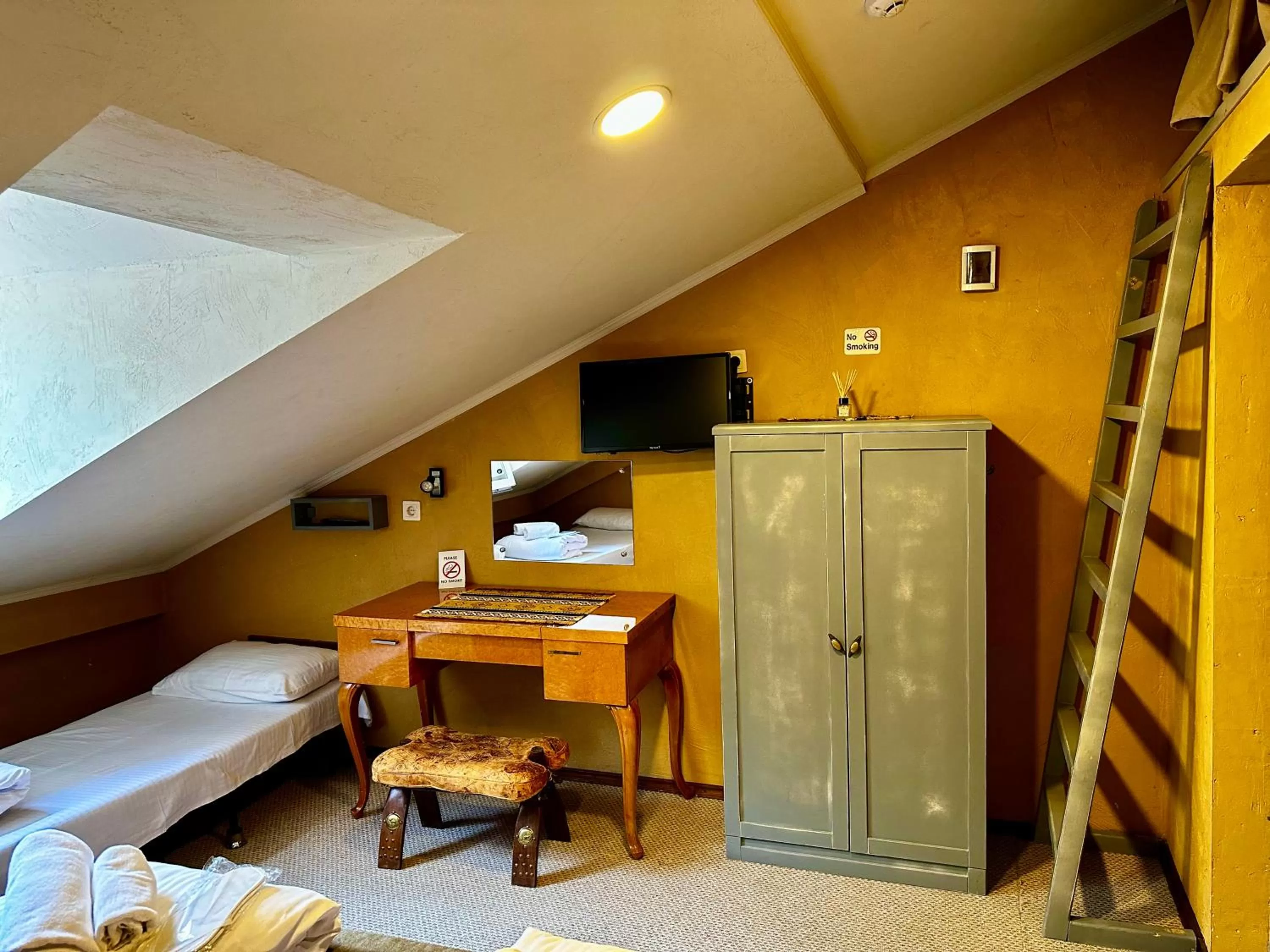 Bed in Kindli Boutique Hotel