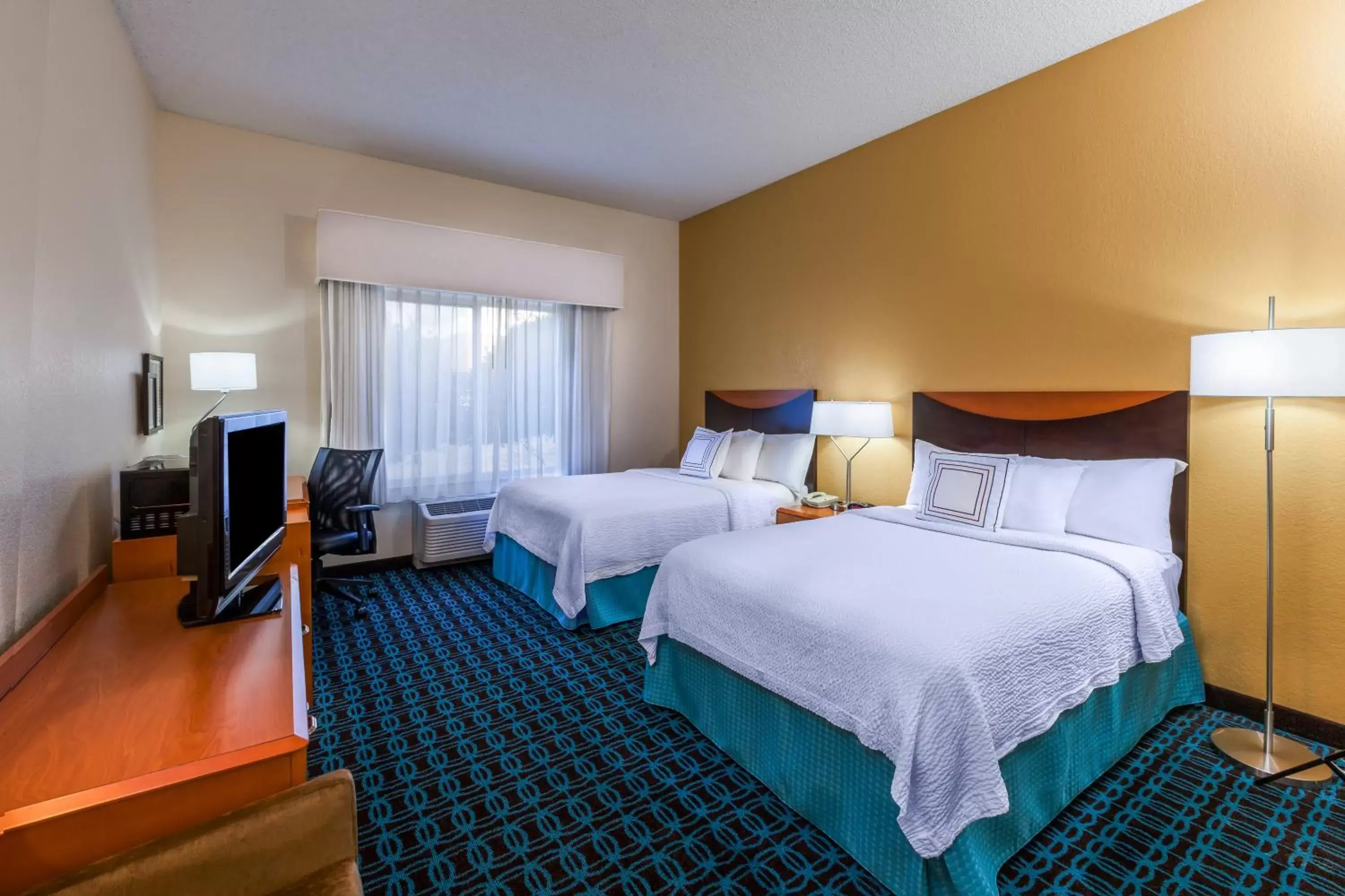 Bed in Fairfield Inn & Suites Houston Intercontinental Airport
