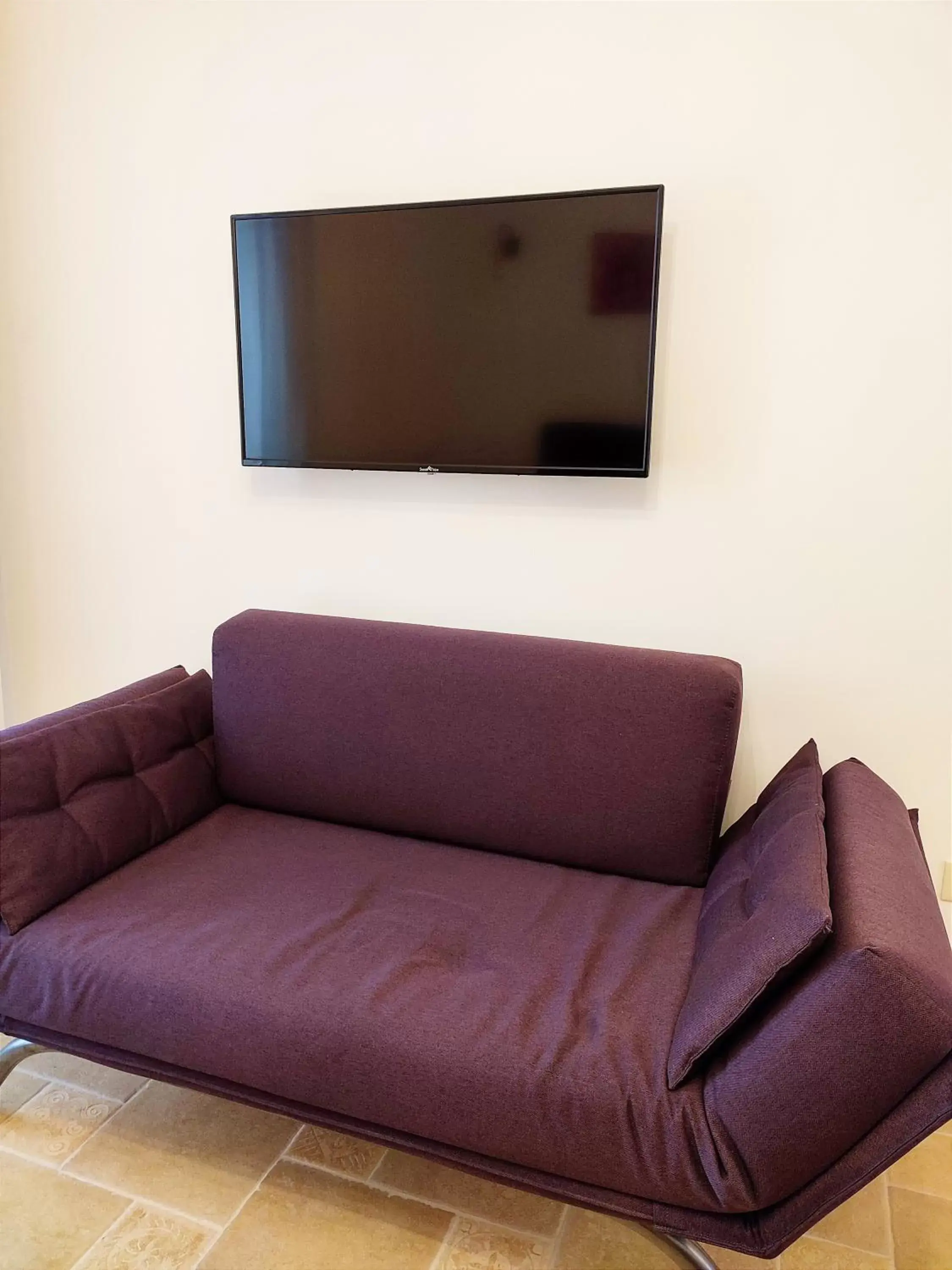 Communal lounge/ TV room, Seating Area in B&B San Vito