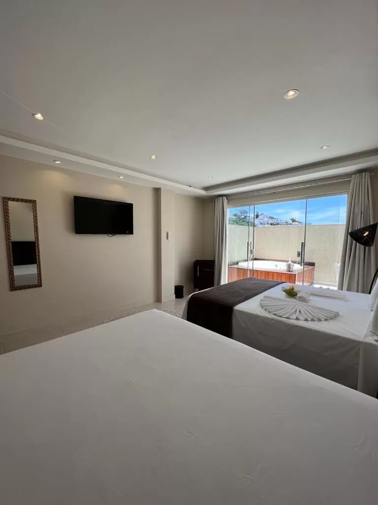 Bed in Pousada Arraial Tropical