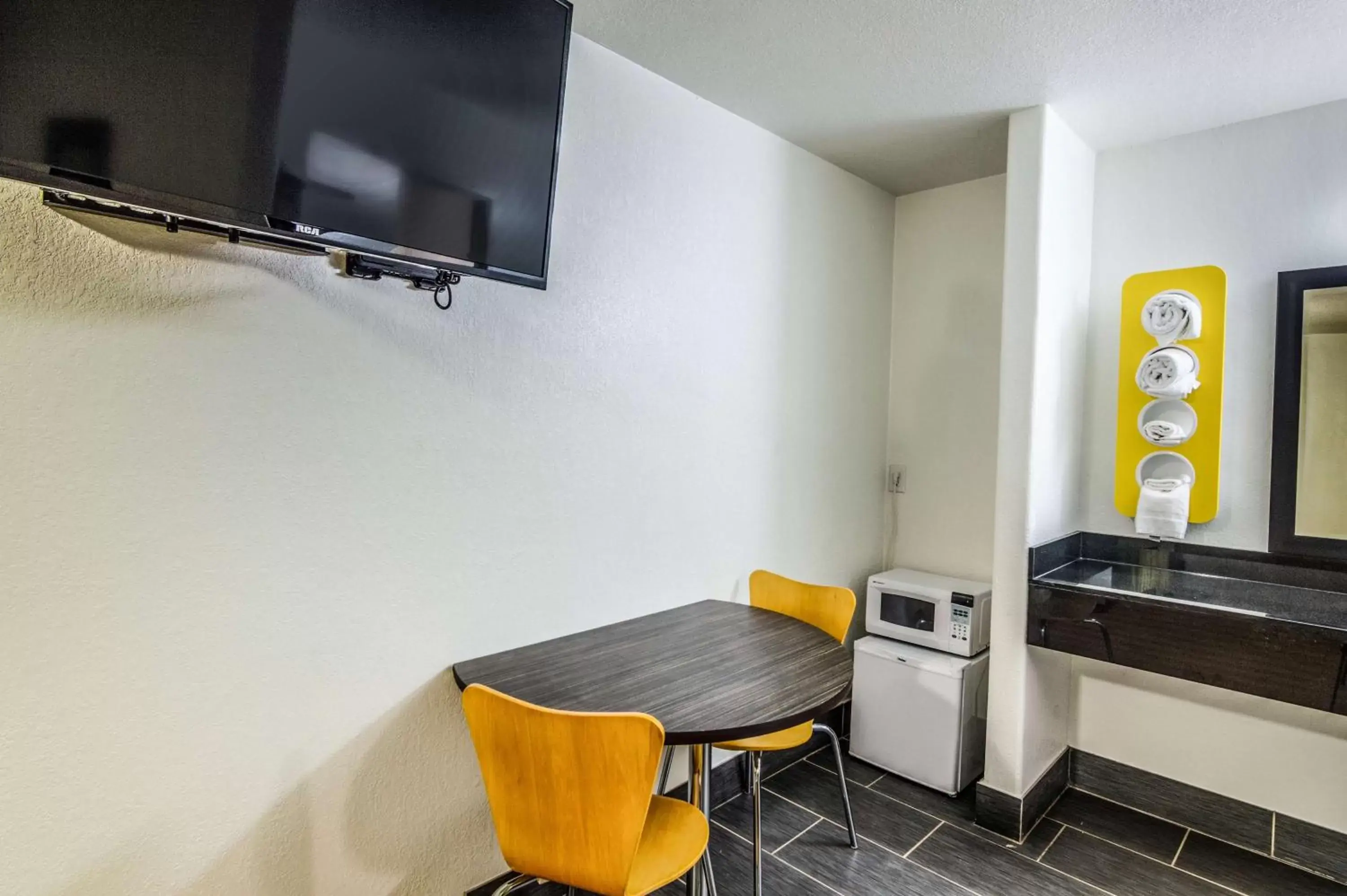 Bathroom, TV/Entertainment Center in Motel 6-Childress, TX