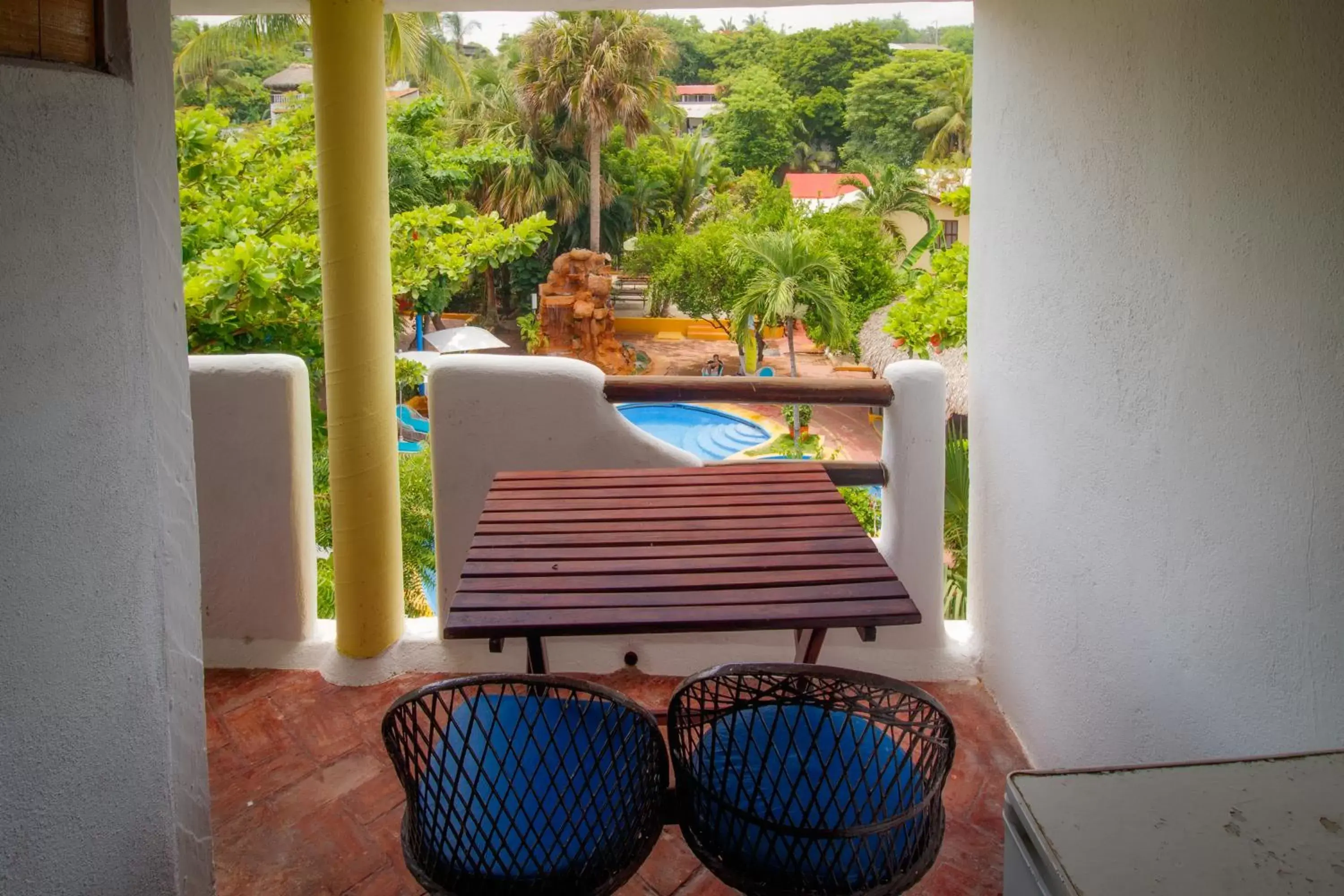 Patio, Pool View in Hotel Bungalows Acuario