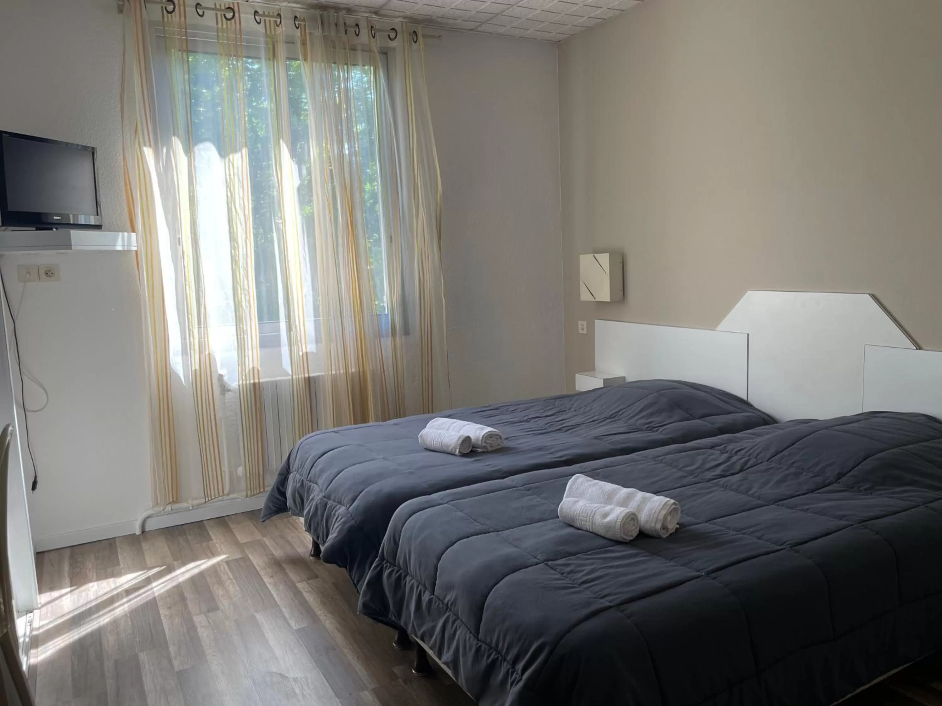 Bed in Hotel Les Chênes