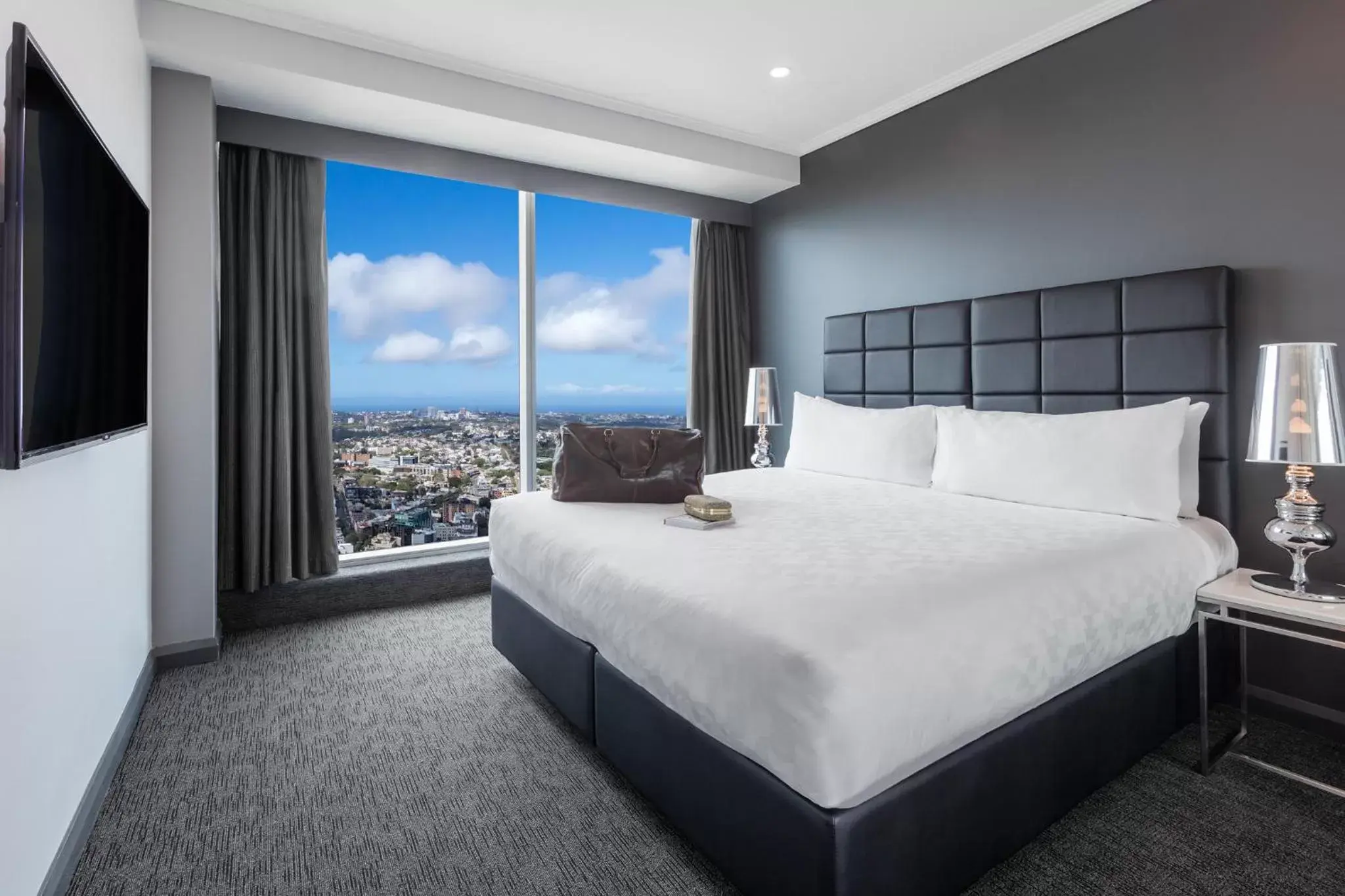 Bed in Meriton Suites World Tower, Sydney