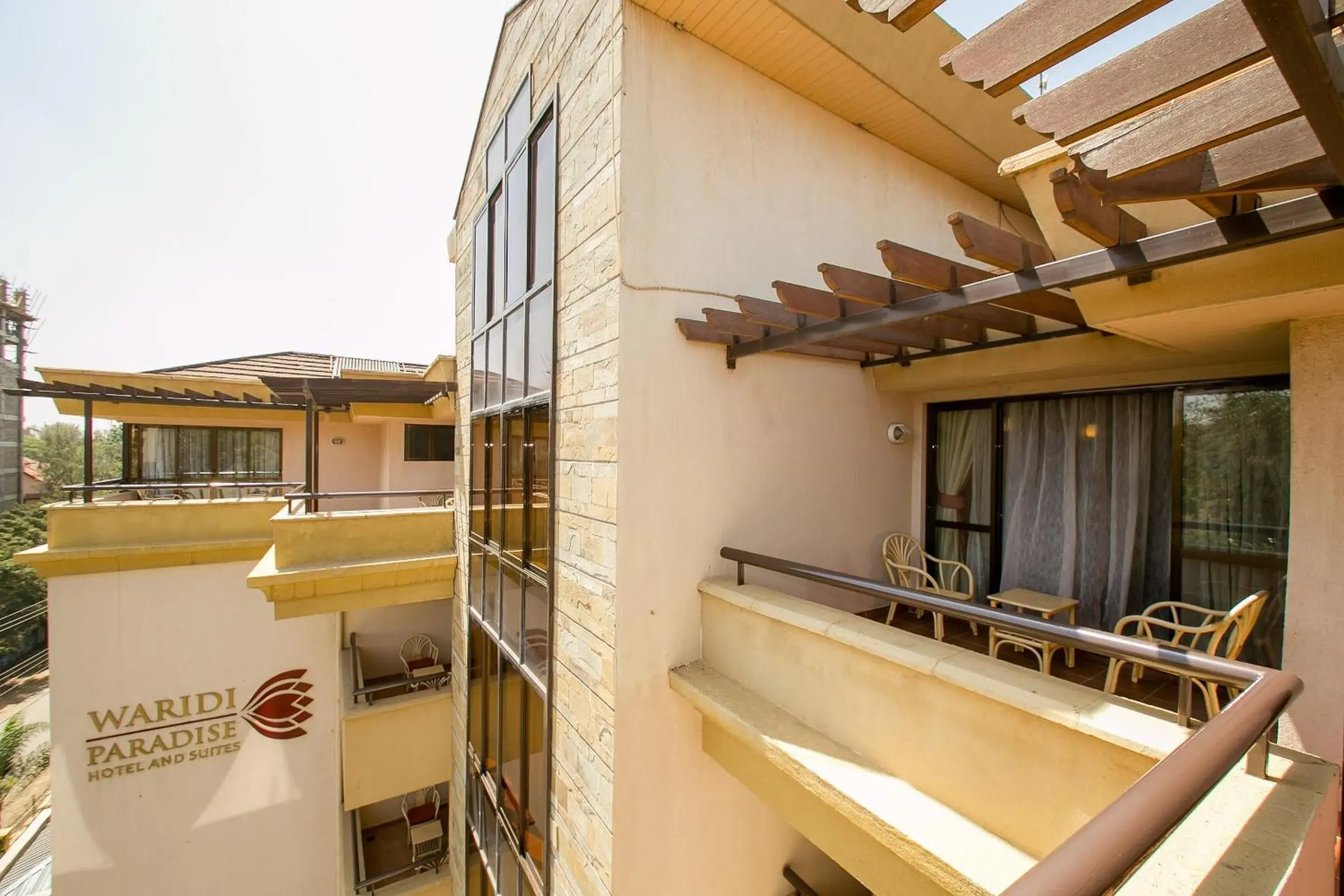 Property building, Balcony/Terrace in Waridi Paradise Hotel and Suites
