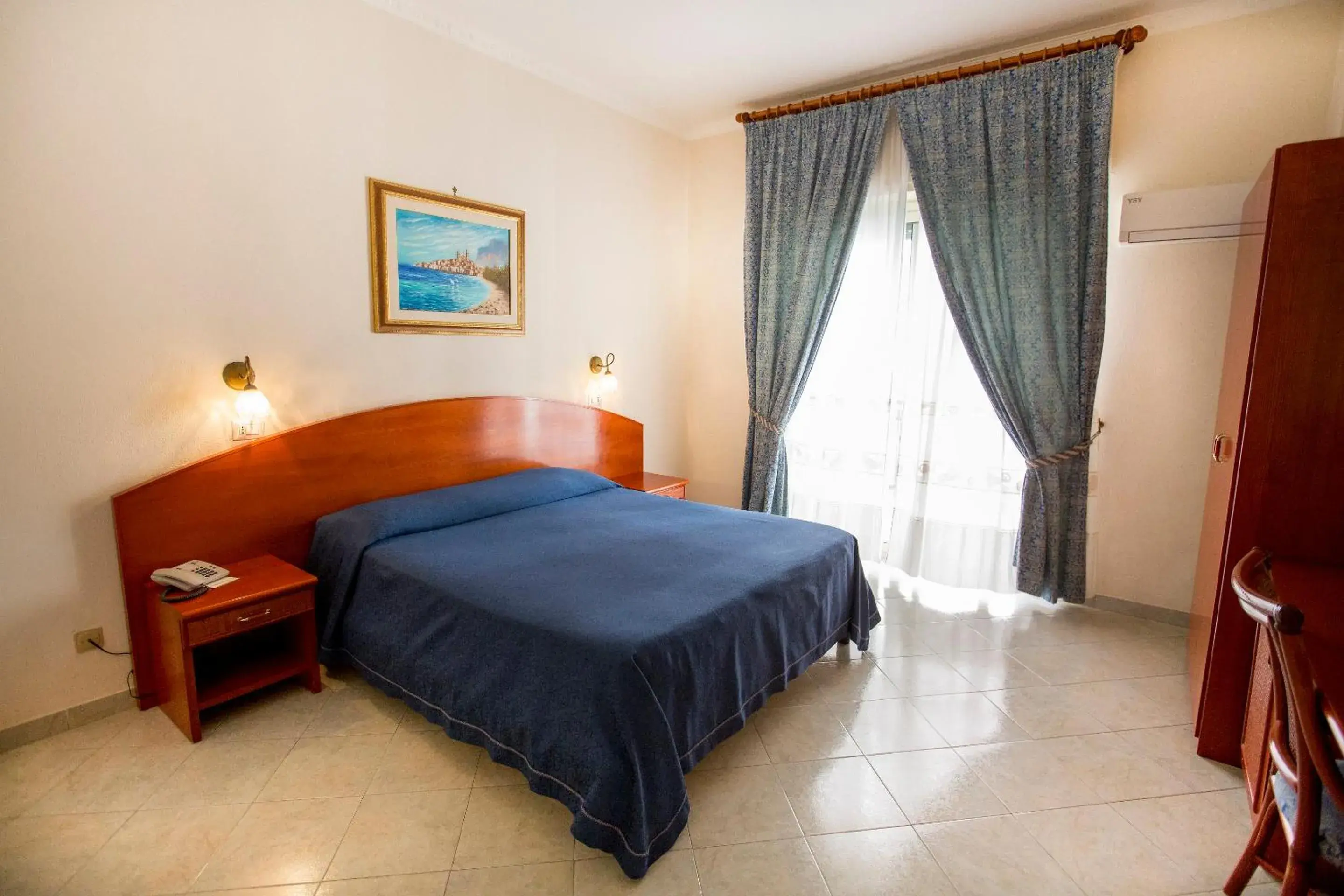 Bed in Hotel Mediterraneo