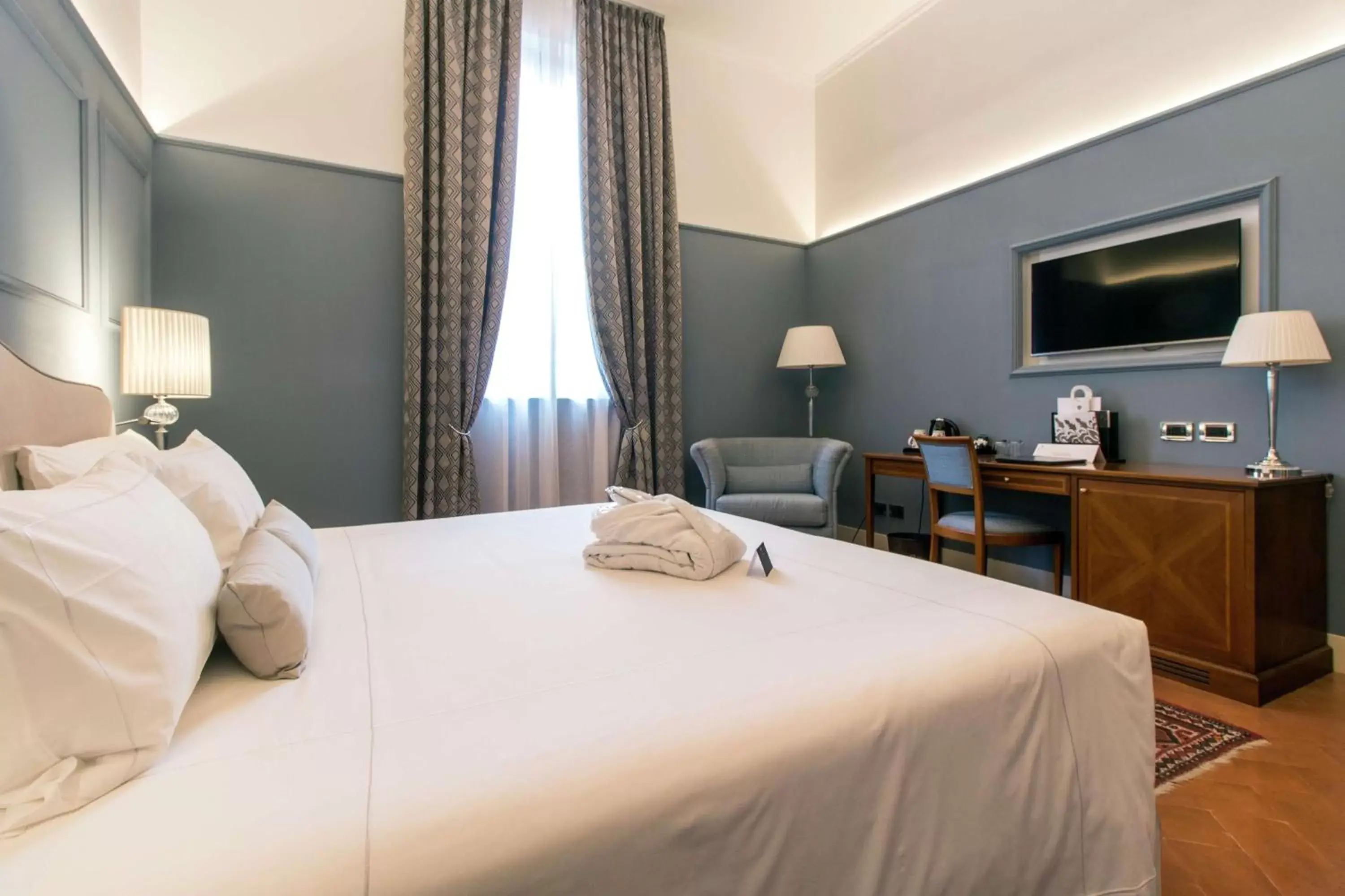 Bed in Grand Hotel Villa Torretta, Curio Collection by Hilton