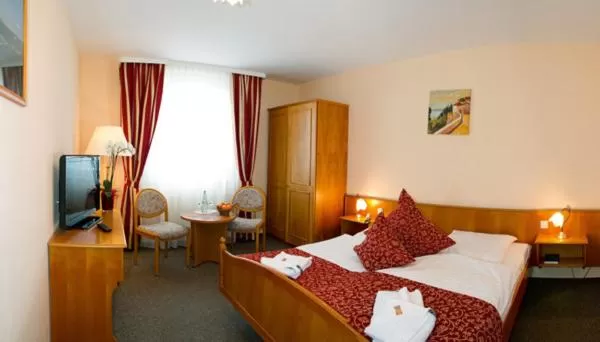Photo of the whole room, Bed in Hotel Auerhahn
