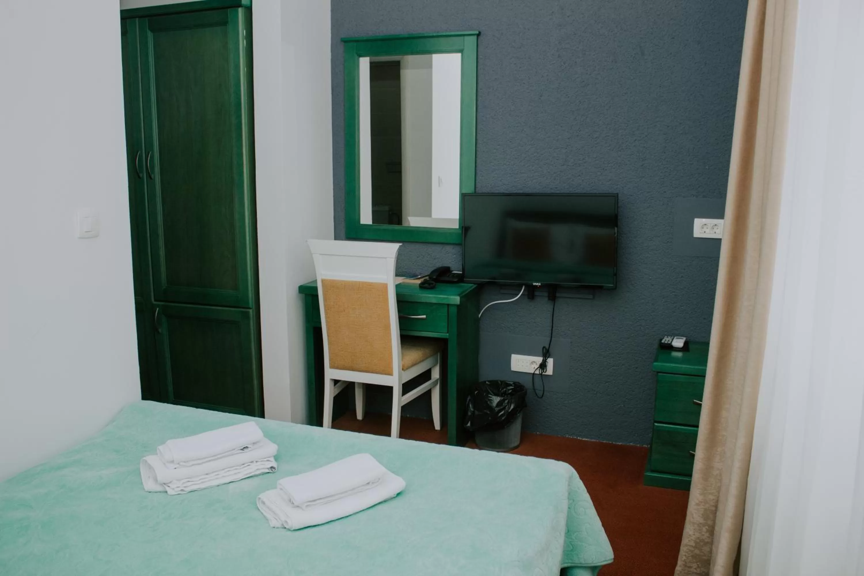 TV and multimedia, Bed in Hotel Serdar