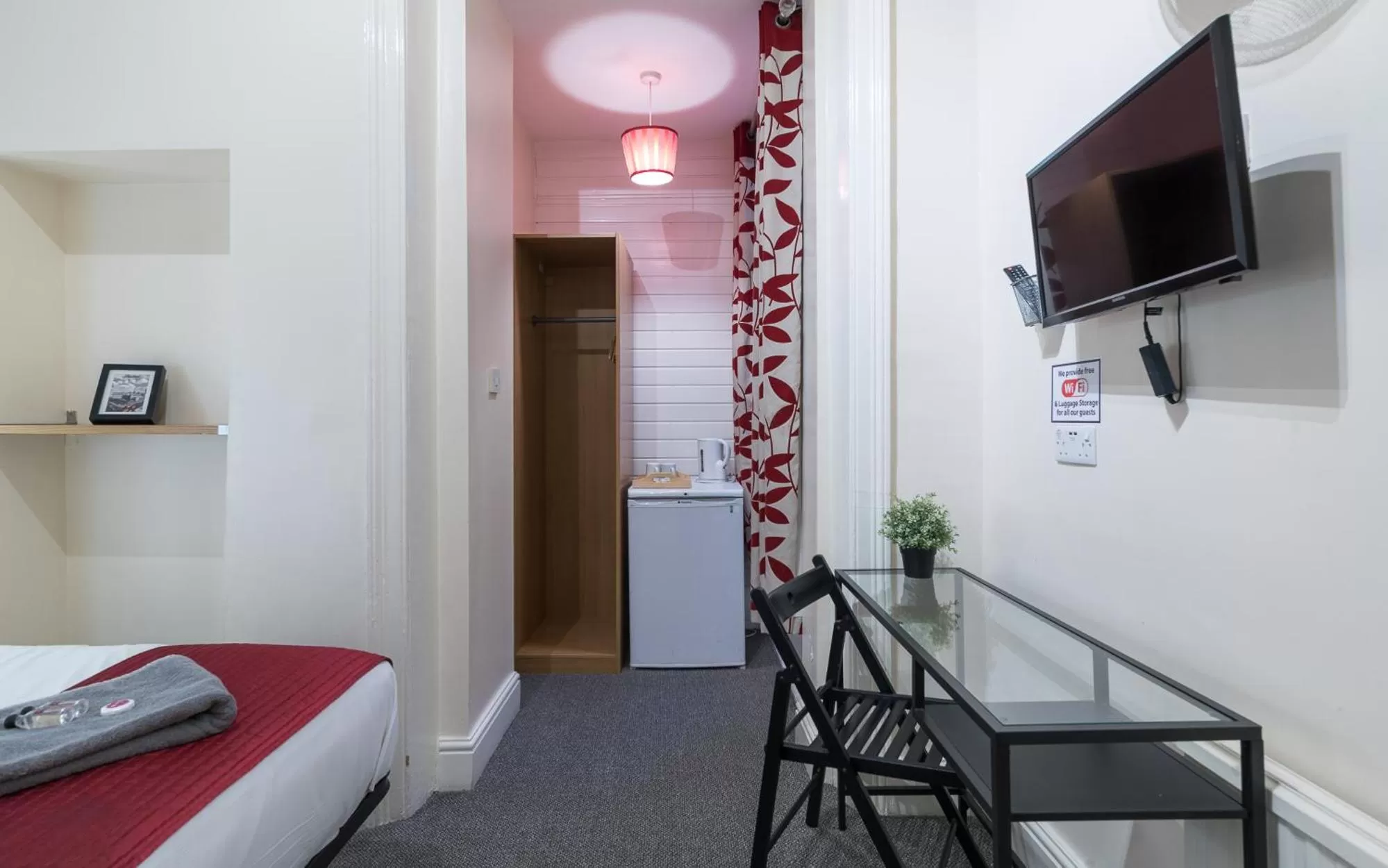 TV/Entertainment Center in Hellenic Hotel by Saba