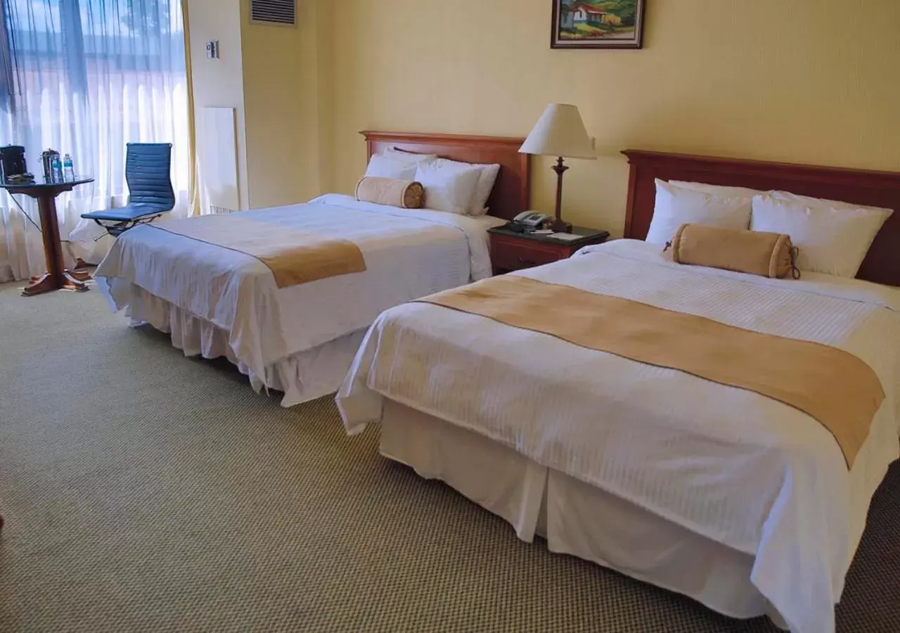 Photo of the whole room, Bed in Wyndham San Jose Herradura