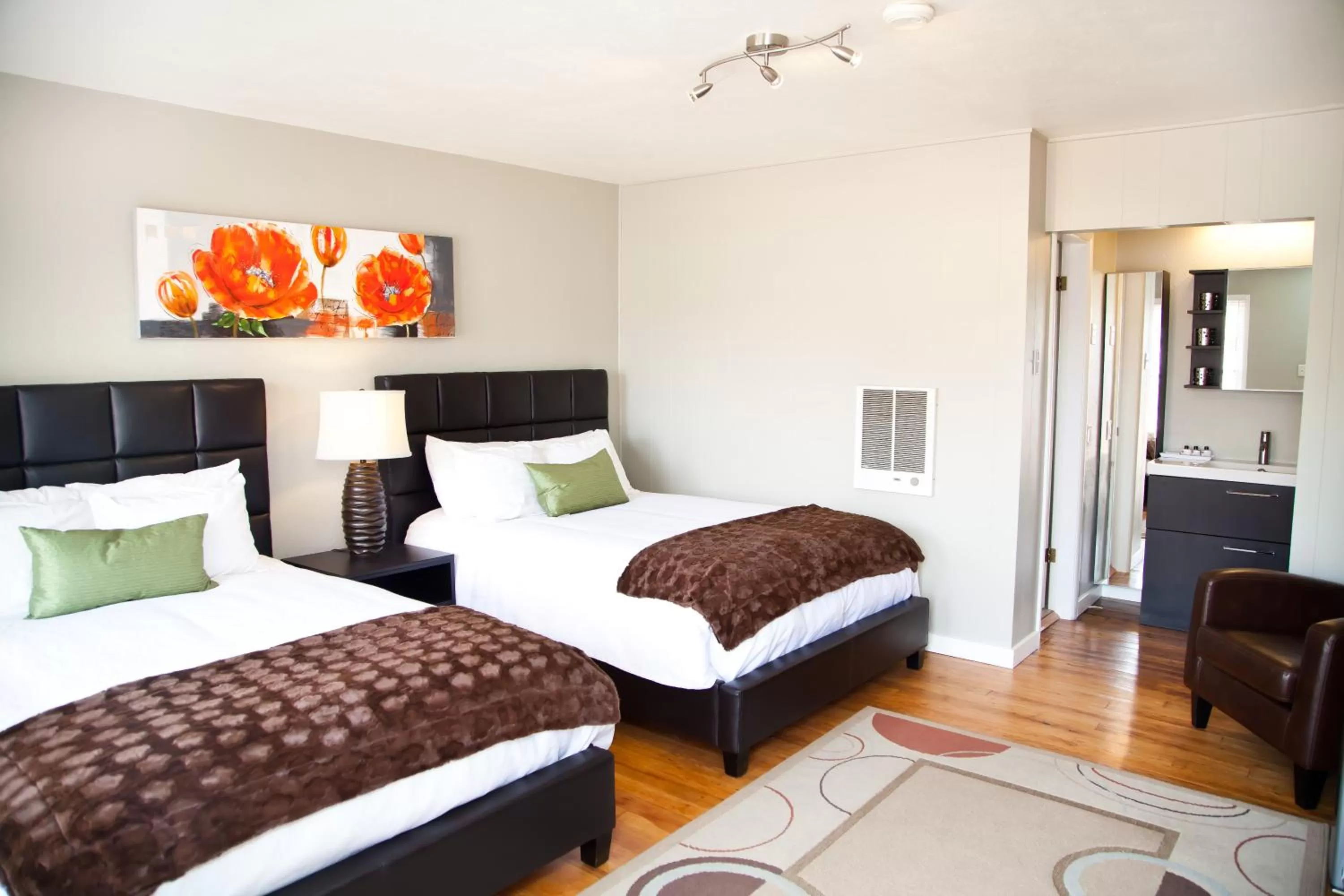 Bedroom, Bed in The Flagstone Boutique Inn & Suites