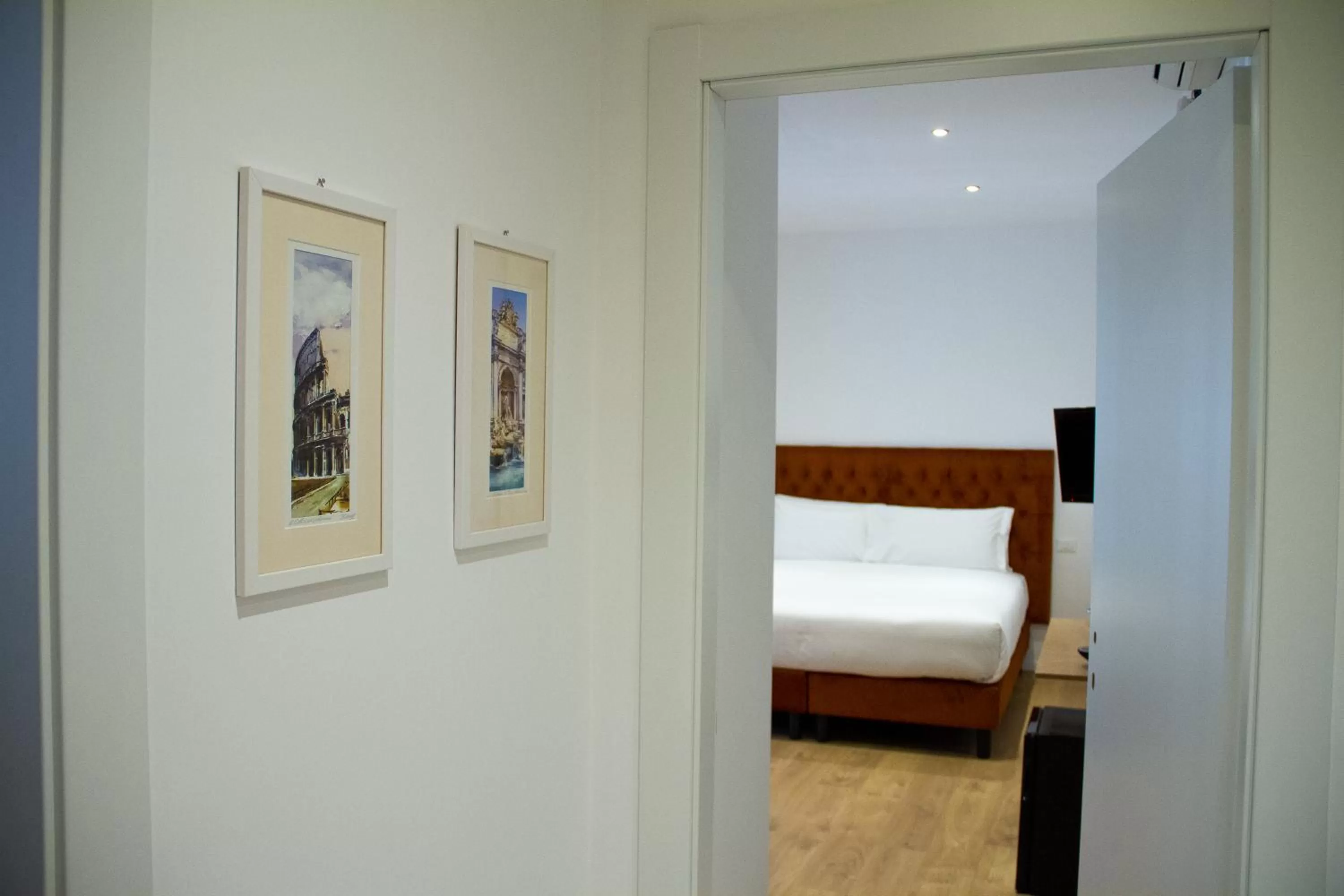 Bed in Michelangelo Vatican Rooms