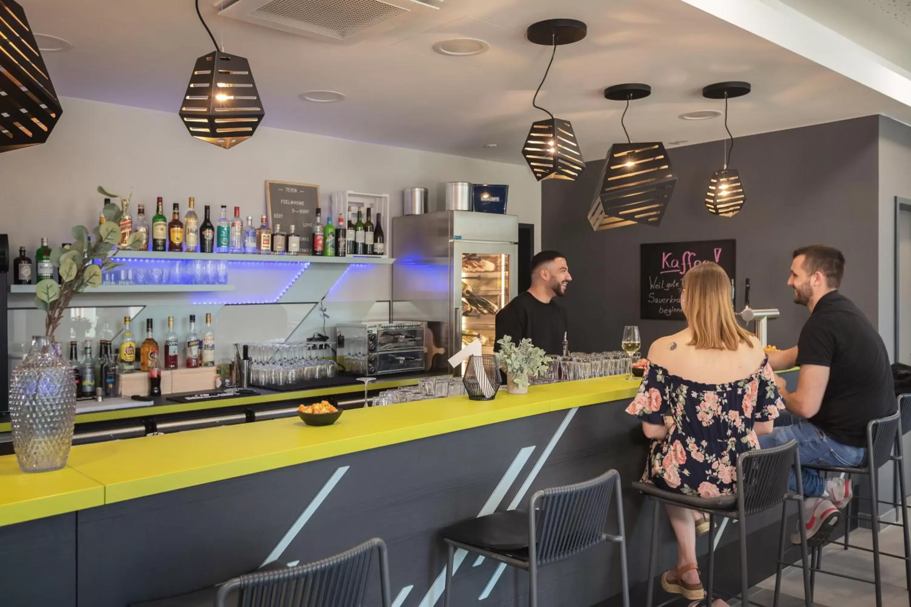 Lounge or bar in Holiday Inn - the niu, Seven Dusseldorf Ost by IHG Lounge or bar in Holiday Inn - the niu, Seven Dusseldorf Ost by IHG