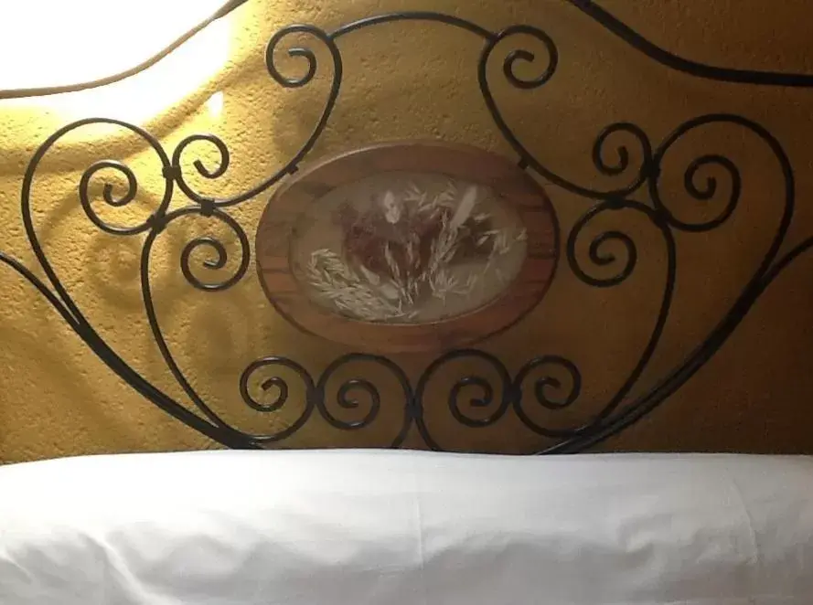 Decorative detail, Bed in Hotel Posada San Antonio