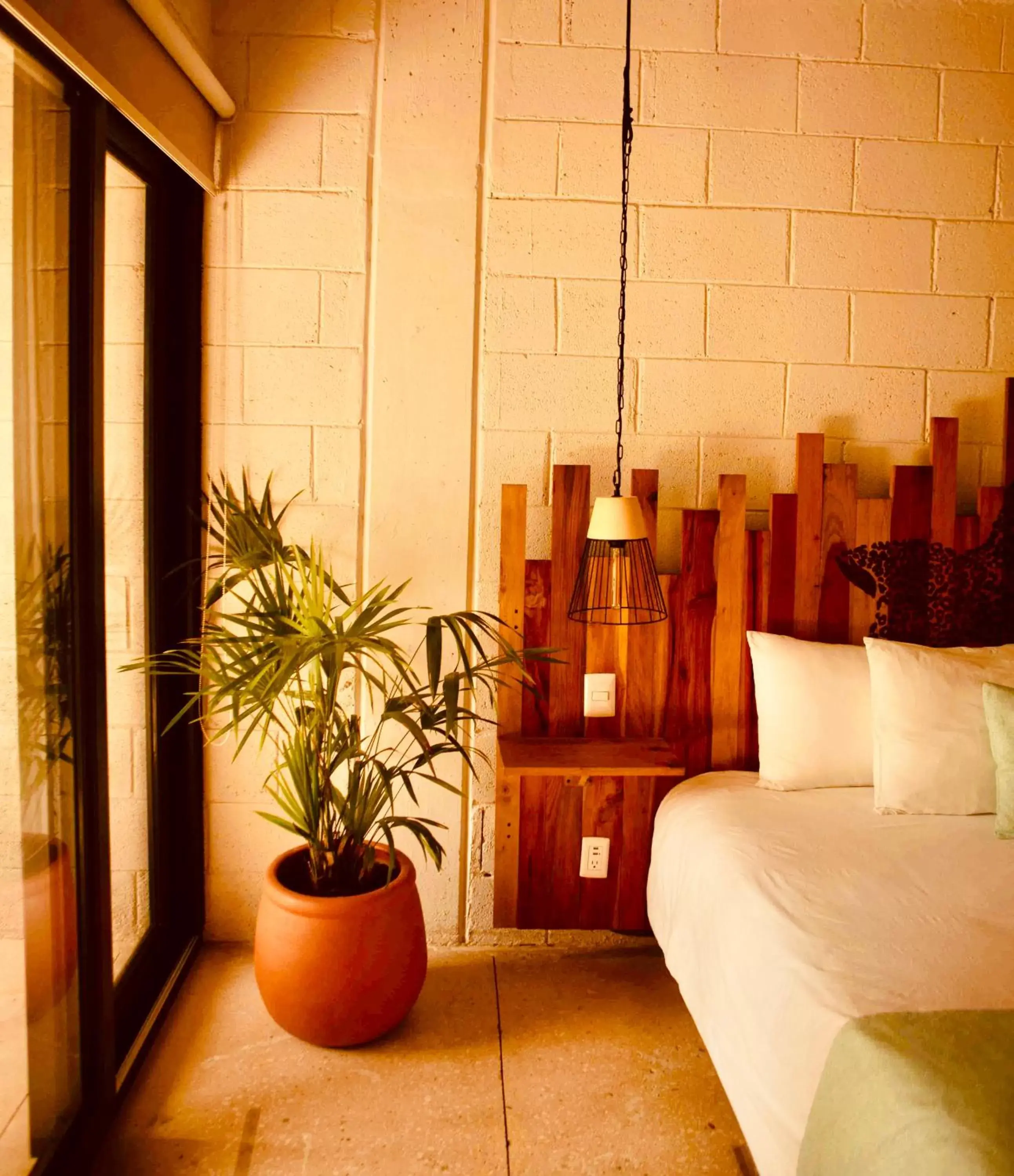 Bedroom in Nomads Hotel, Hostel & Beachclub