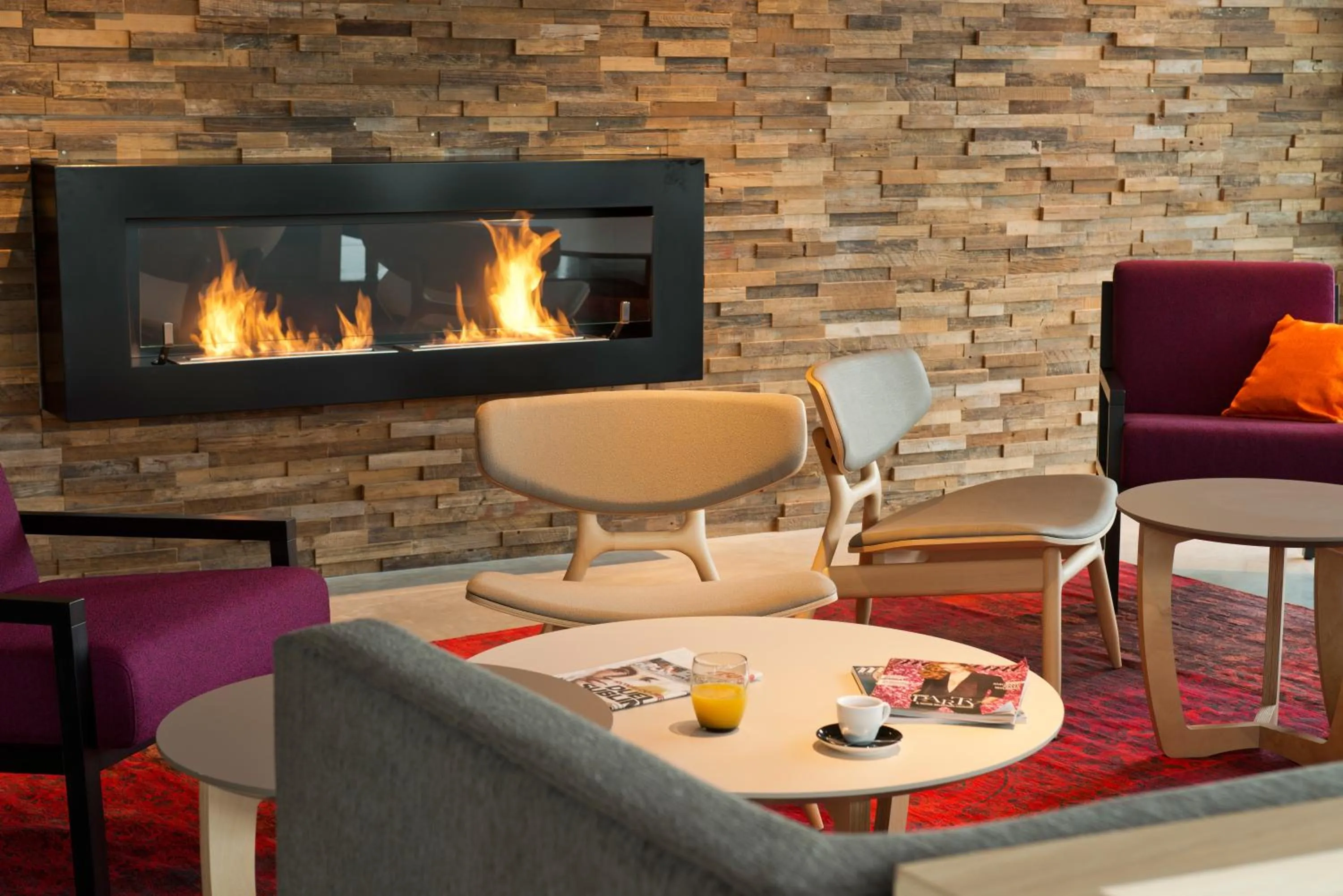 Communal lounge/ TV room in Nomad Hotel le Havre Centre Gare