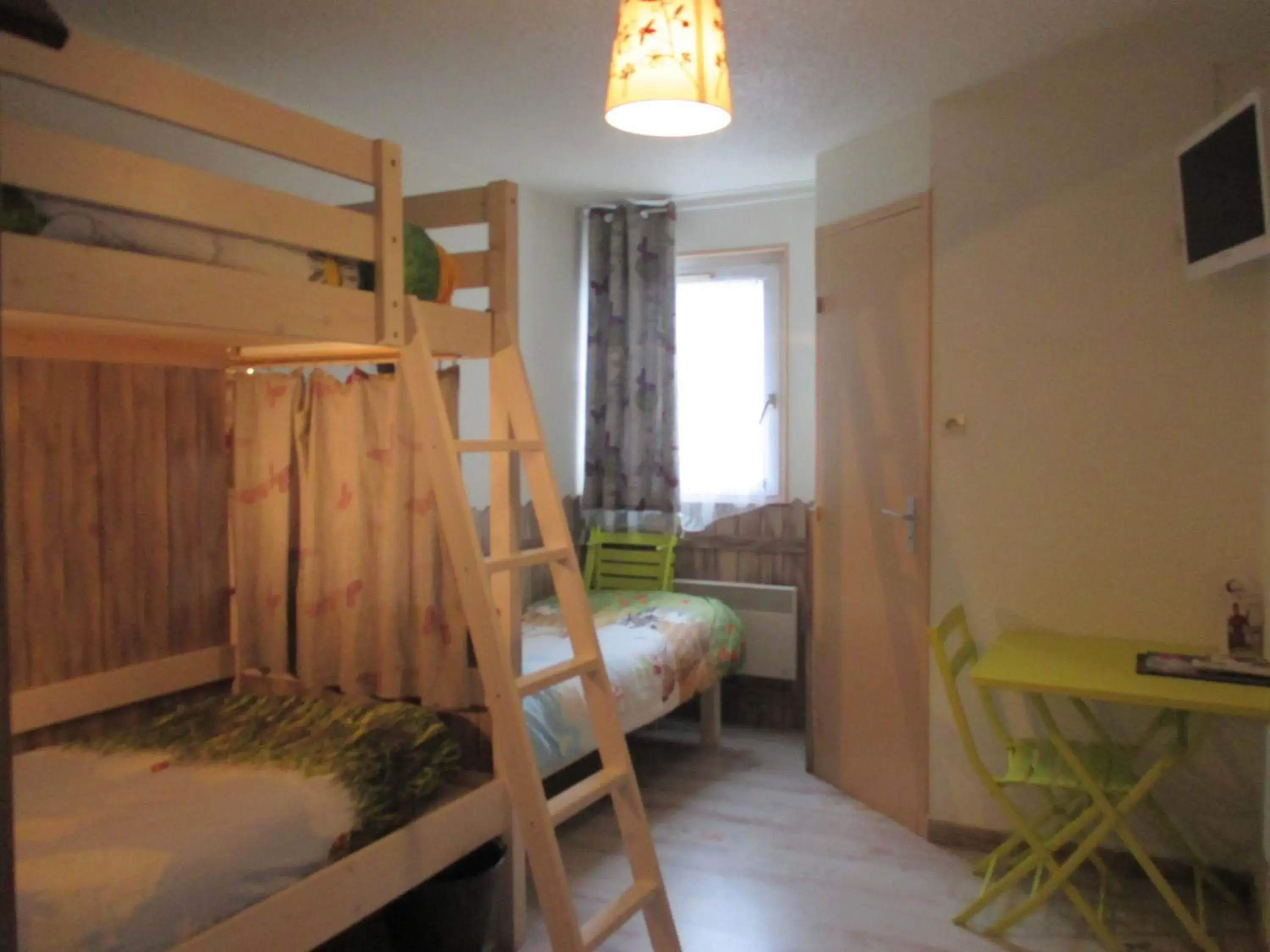 Photo of the whole room, Bunk Bed in Contact Hôtel Come Inn