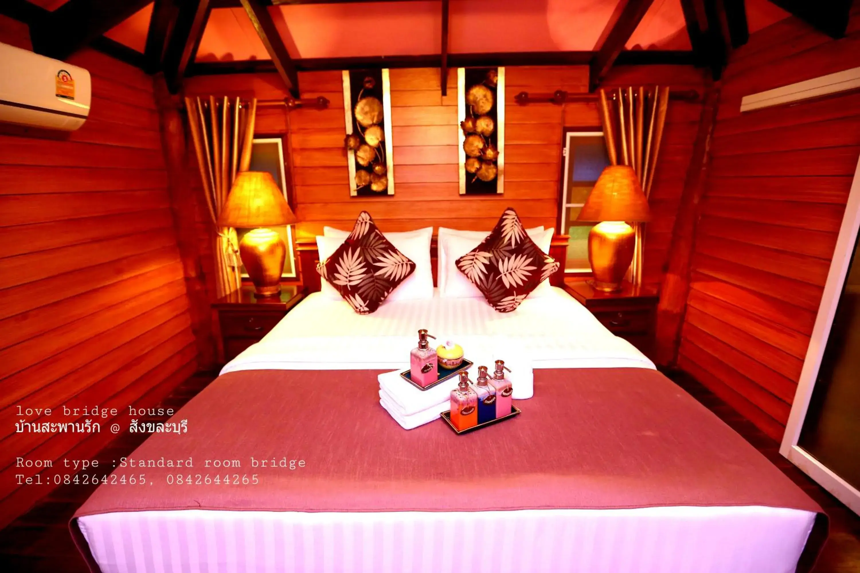 Bed in Love Bridge House Resort