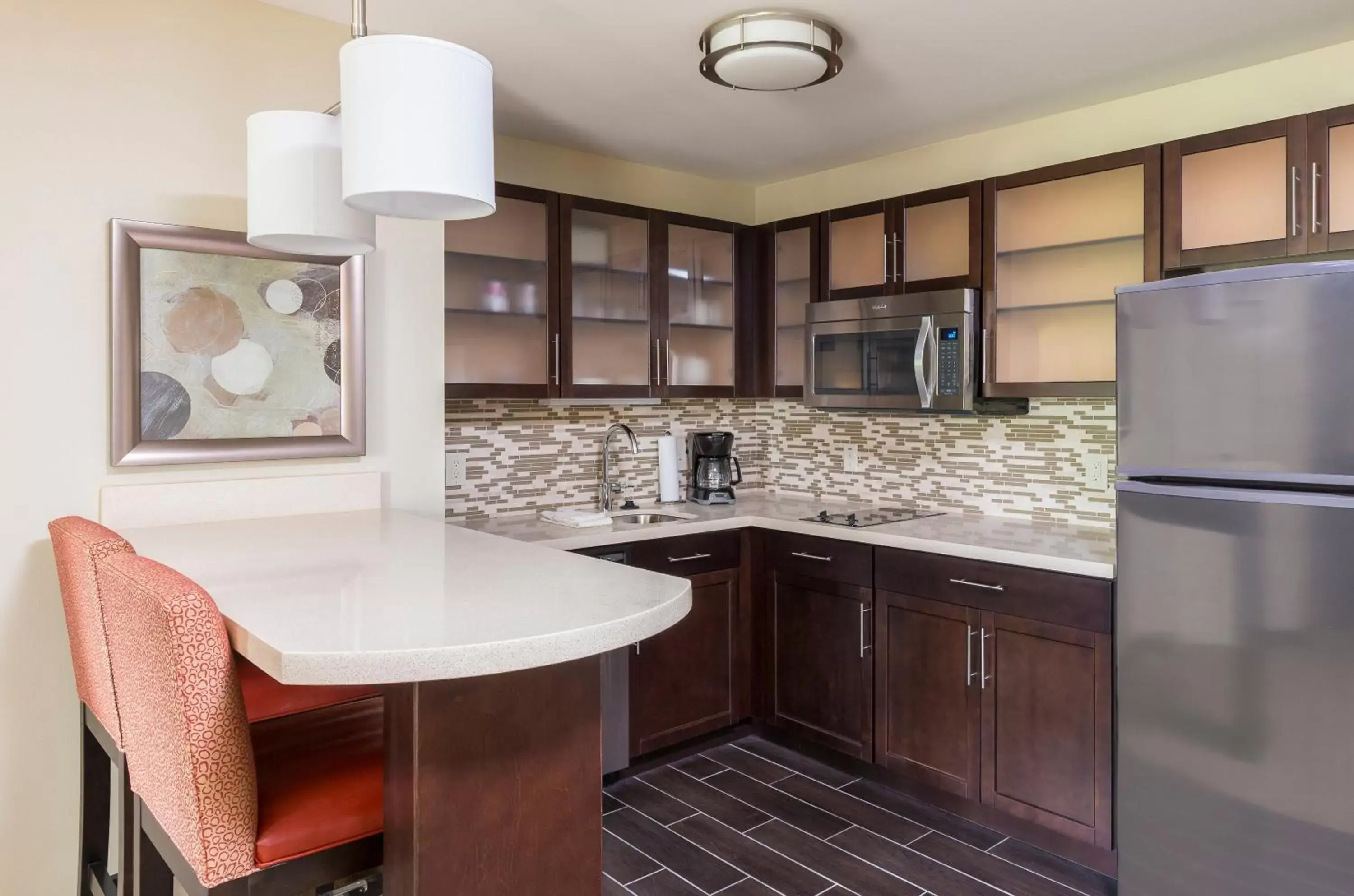 Photo of the whole room, Kitchen/Kitchenette in Staybridge Suites Canton, an IHG Hotel