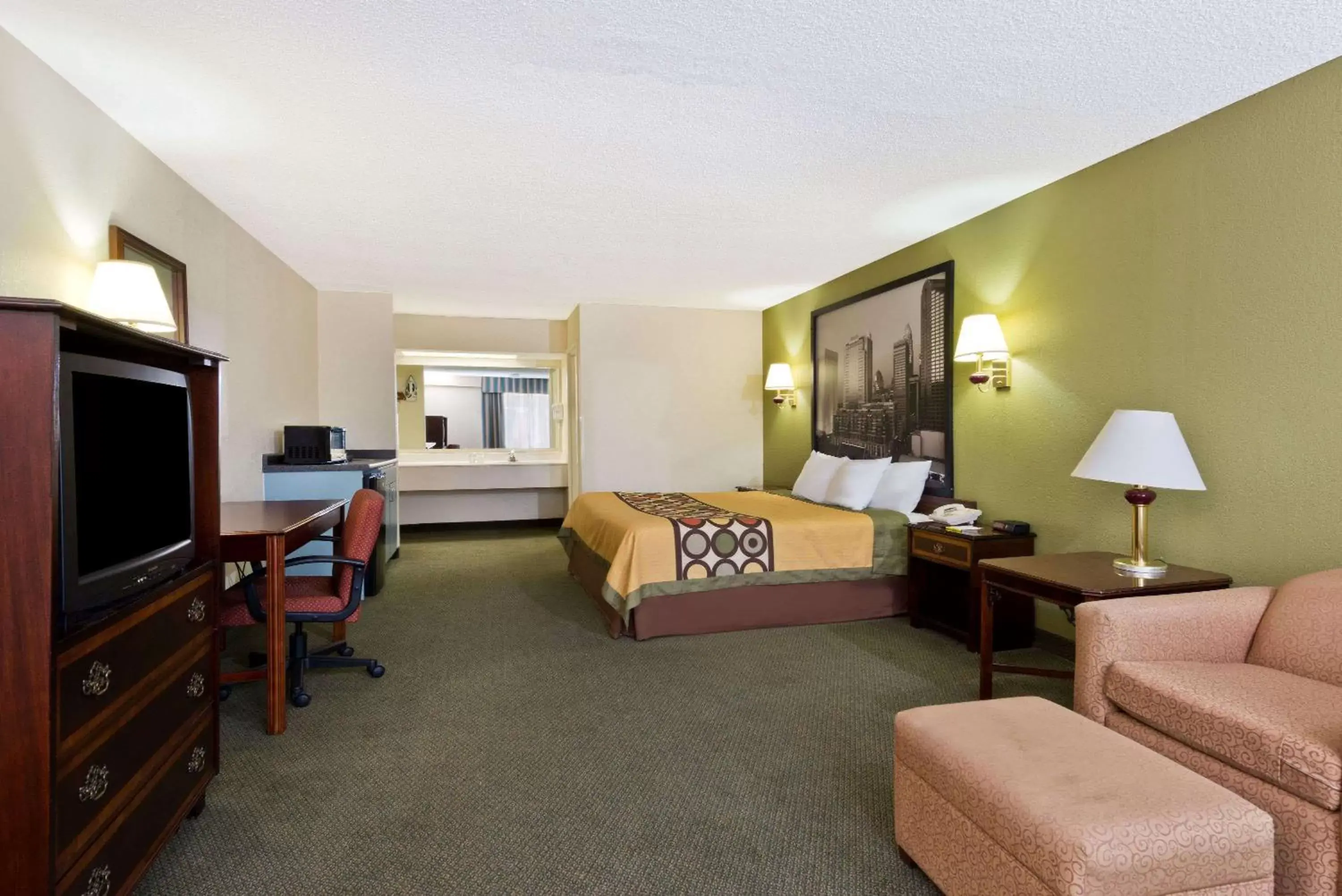 Photo of the whole room, TV/Entertainment Center in Super 8 by Wyndham Huntersville/Charlotte Area