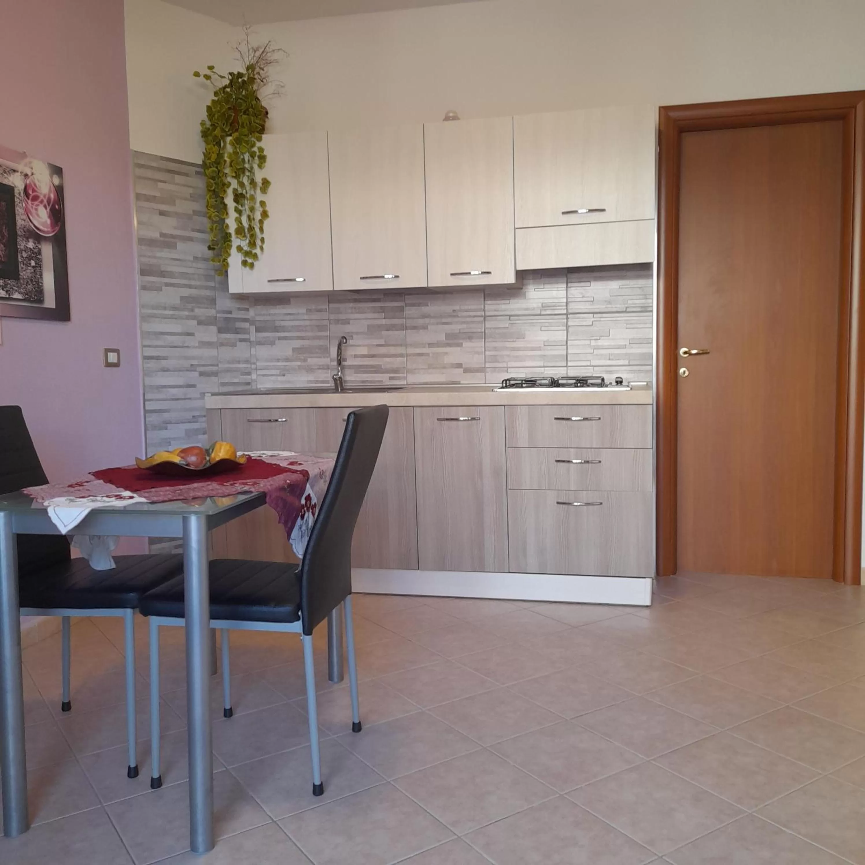 Kitchen or kitchenette in La Fortezza casa vacanze & appartament