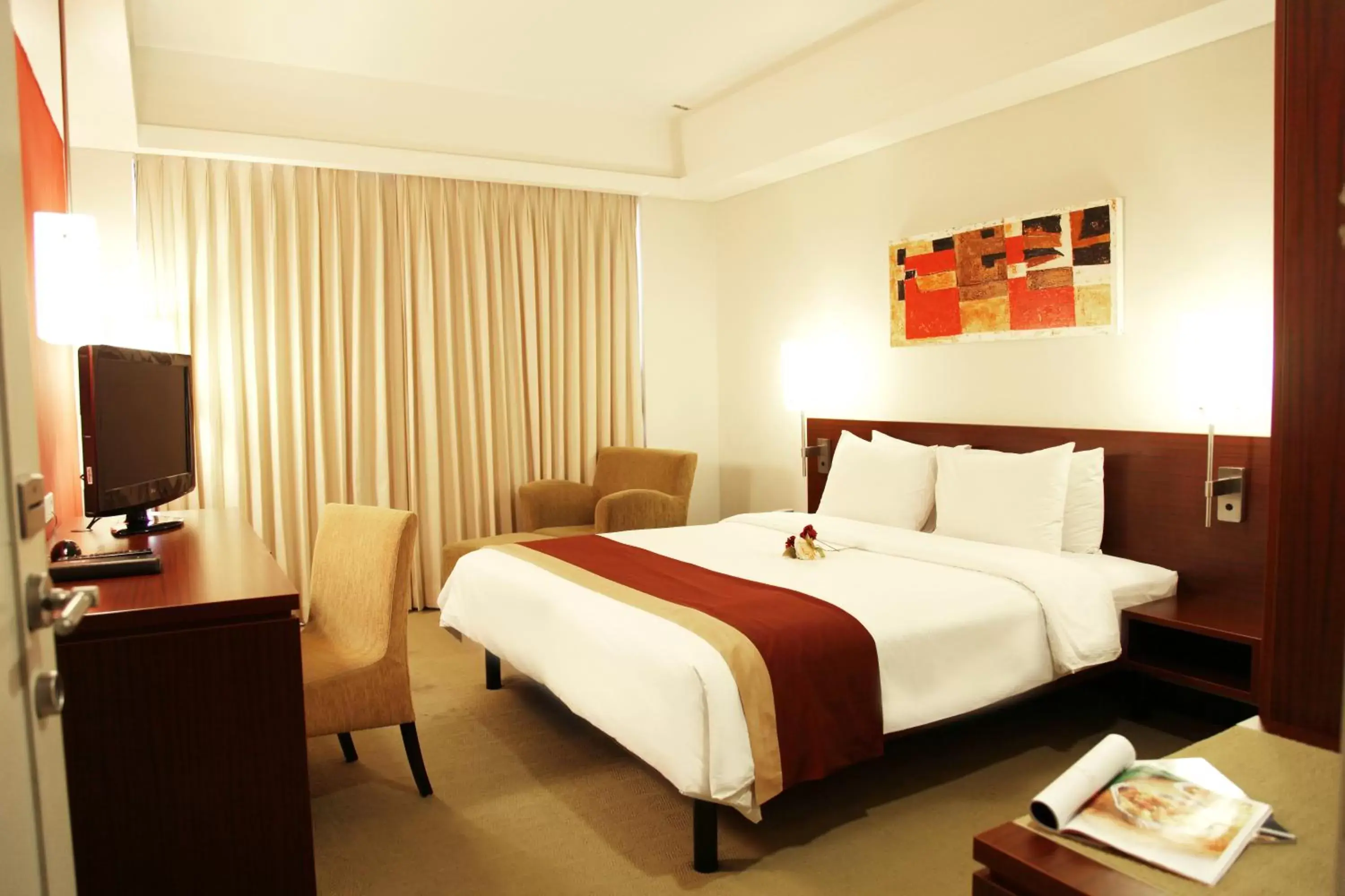 Bed in Java Paragon Hotel & Residences