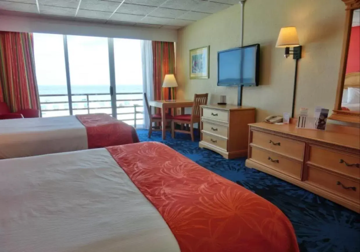 Queen Room with Two Queen Beds and Beach View in Dolphin Beach Resort Queen Room with Two Queen Beds and Beach View in Dolphin Beach Resort
