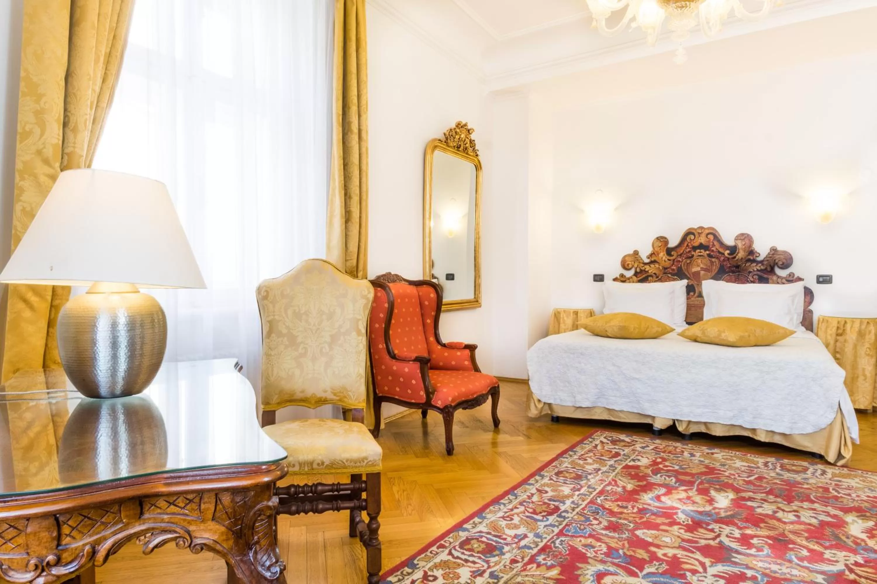 Seating area, Bed in Charles Bridge Palace