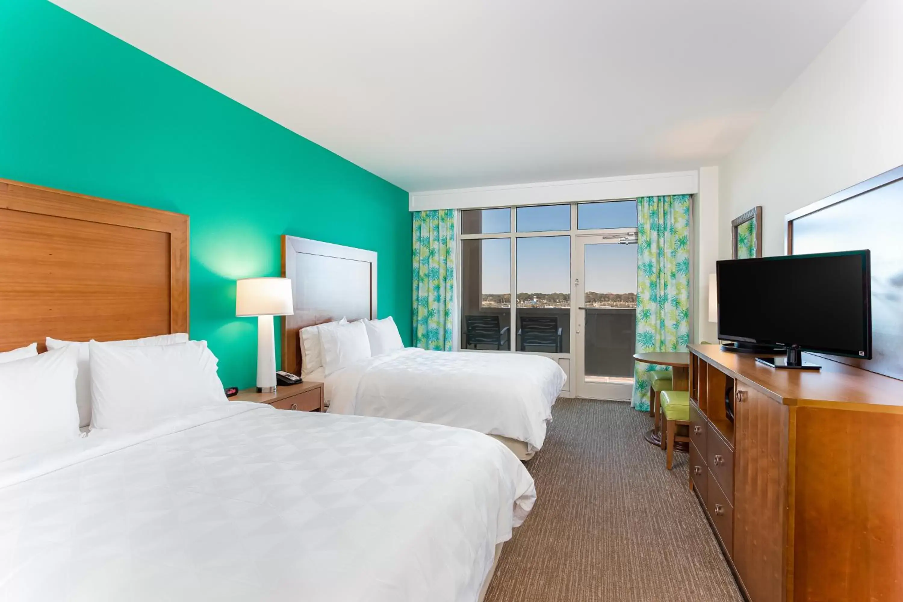 Photo of the whole room, TV/Entertainment Center in Holiday Inn Resort Fort Walton Beach, an IHG Hotel