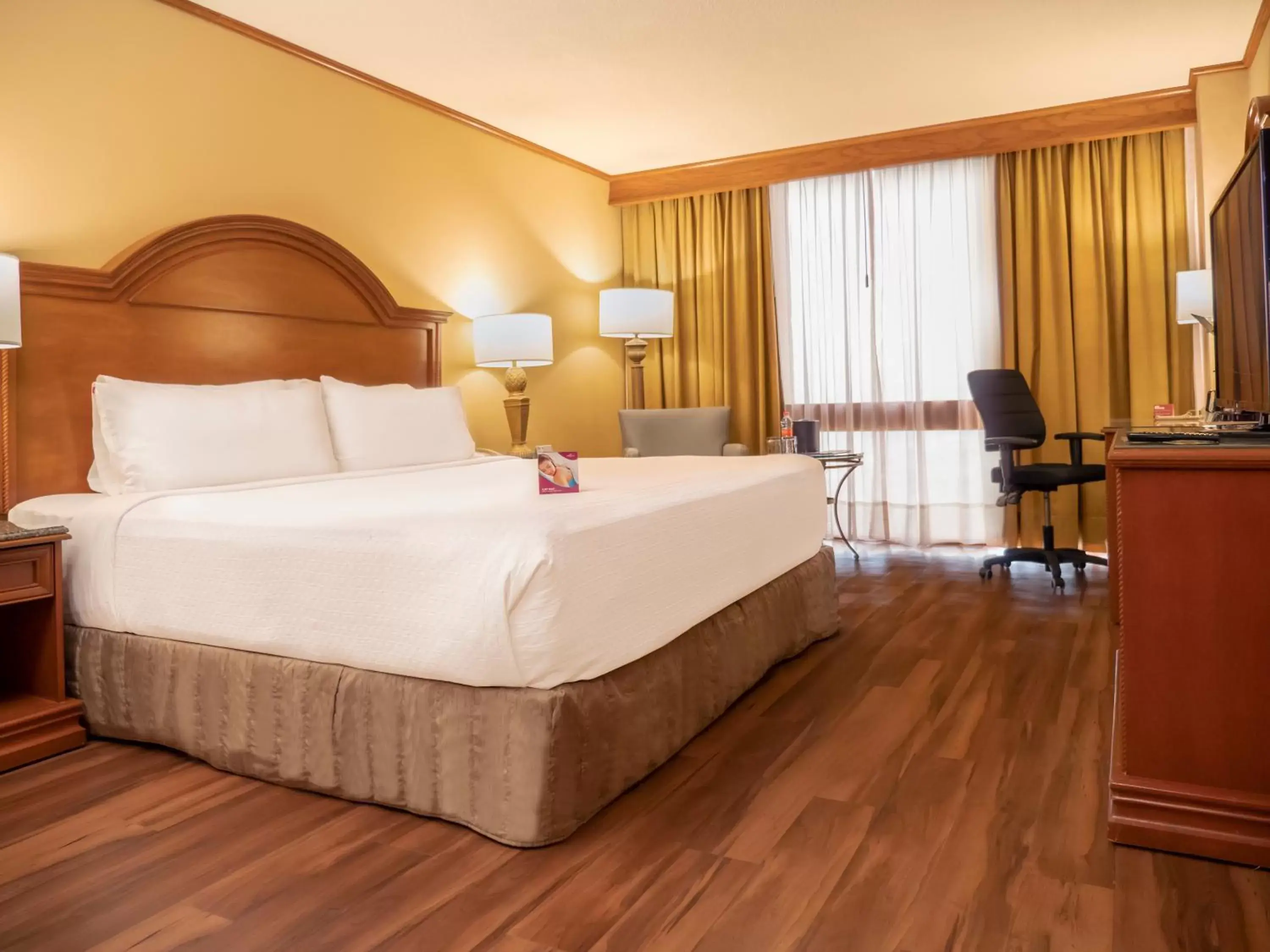 Bedroom, Bed in Crowne Plaza Hotel Monterrey, an IHG Hotel