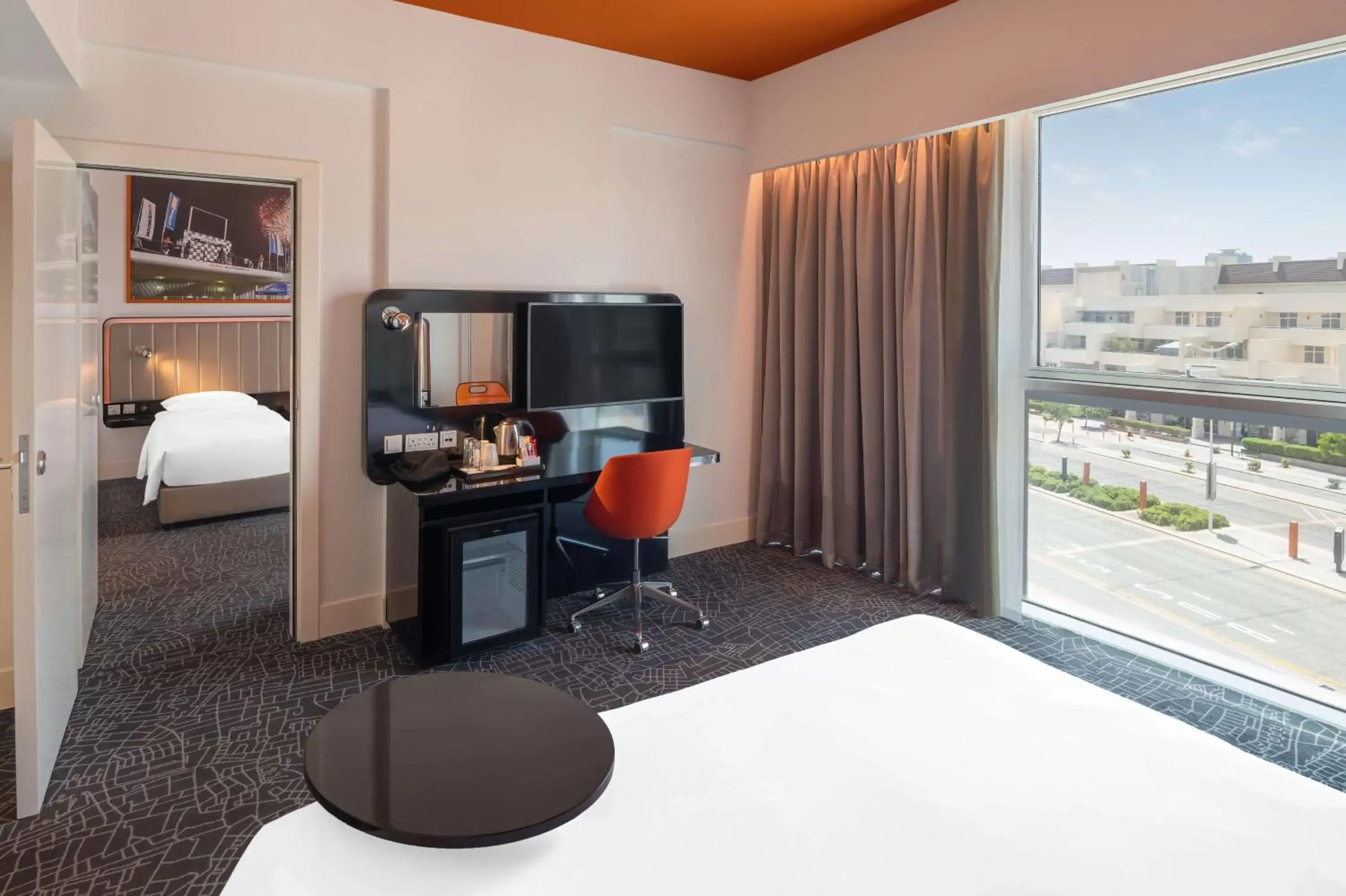 Bedroom, TV/Entertainment Center in Park Inn by Radisson Dubai Motor City