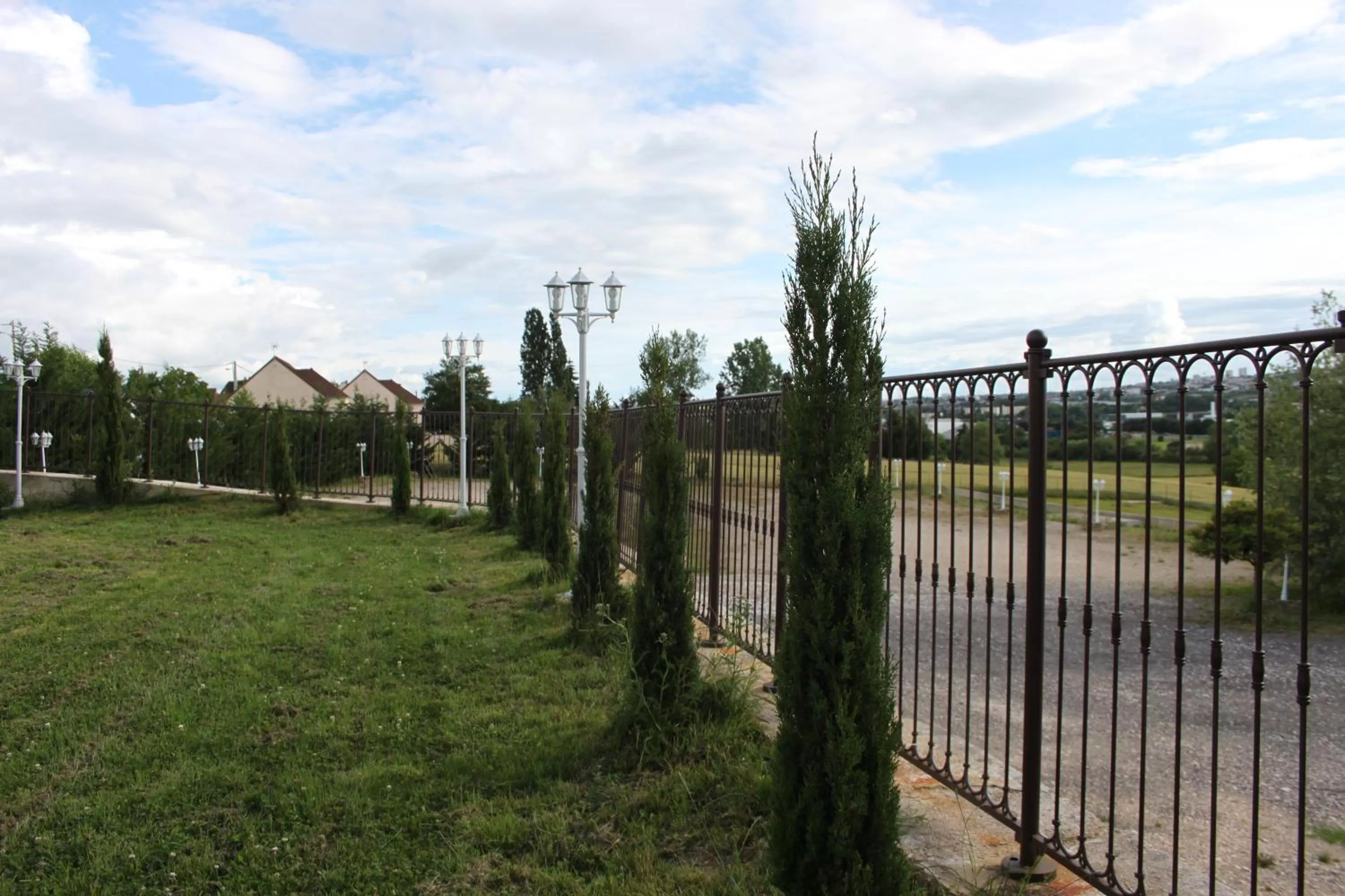 Garden in Appart'Hôtel Auxerre