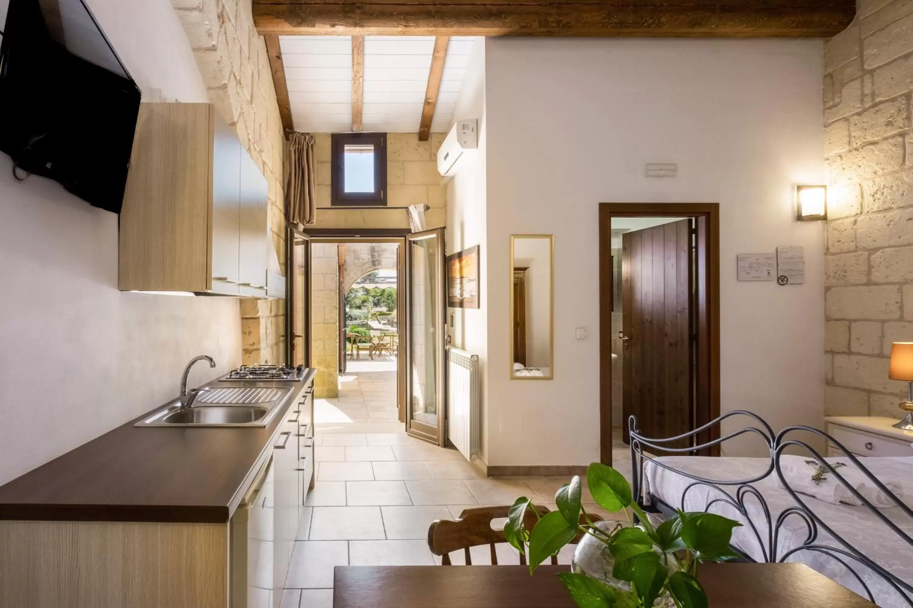 Kitchen/Kitchenette in Agriturismo Masseria Costarella