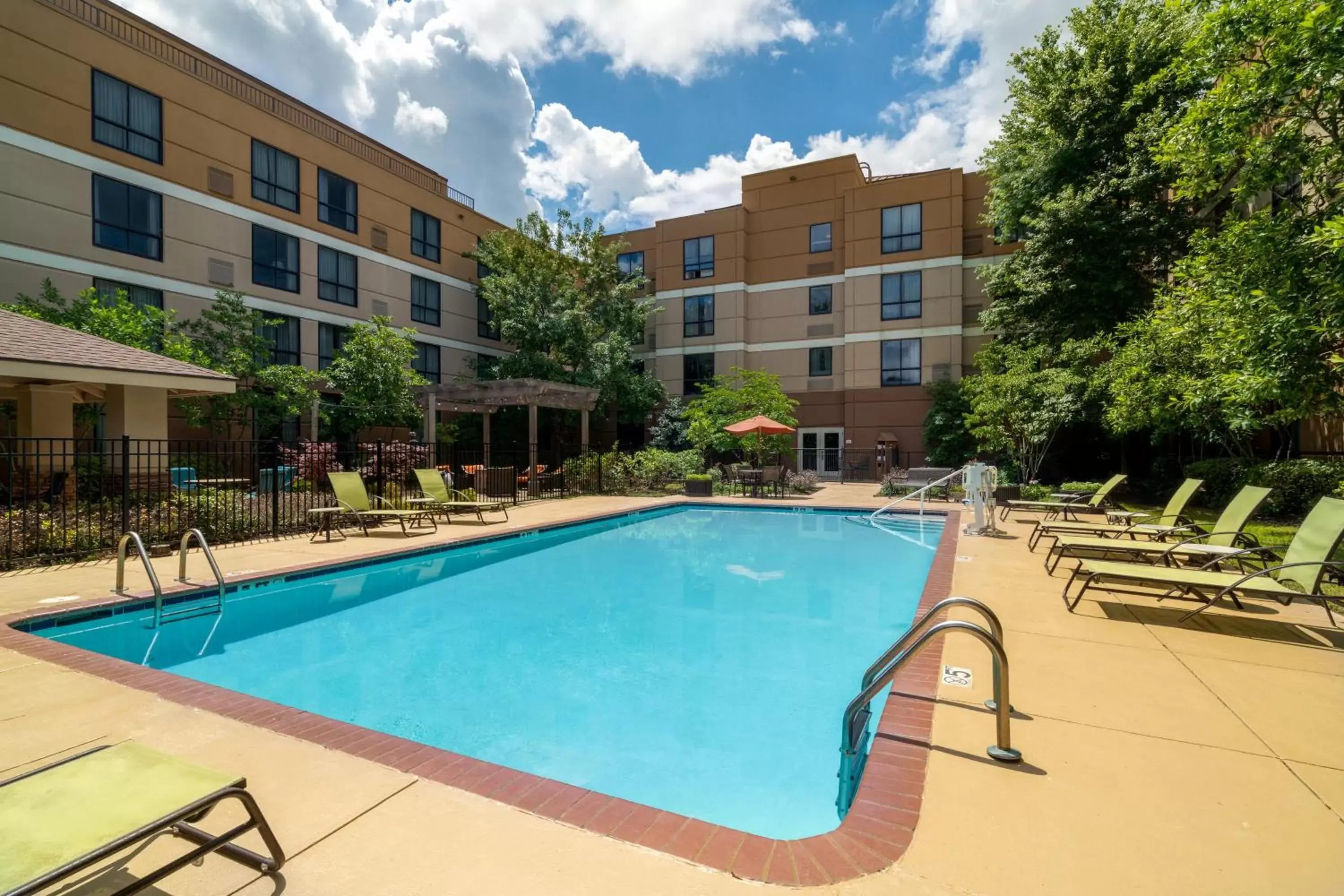 Swimming Pool in Staybridge Suites Memphis-Poplar Ave East, an IHG Hotel