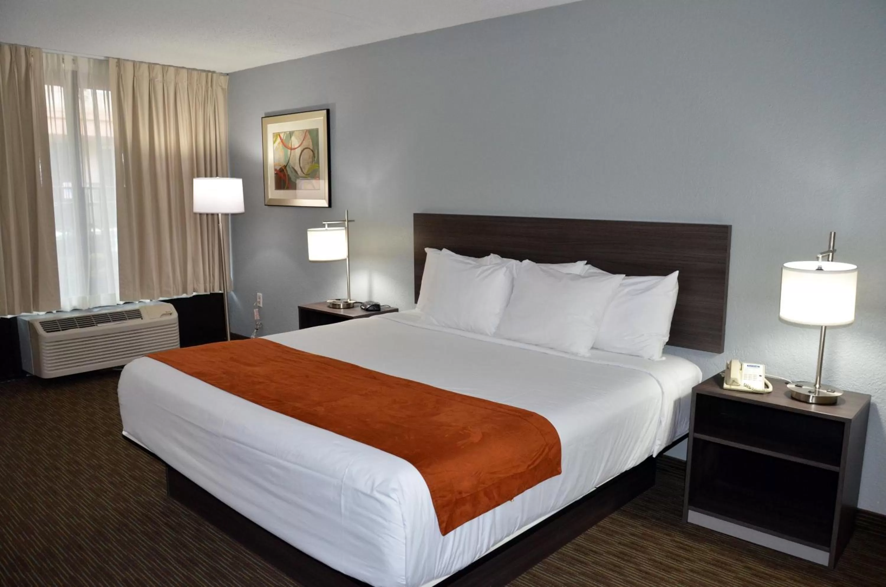 Bedroom, Bed in Days Inn & Suites by Wyndham Orlando Airport