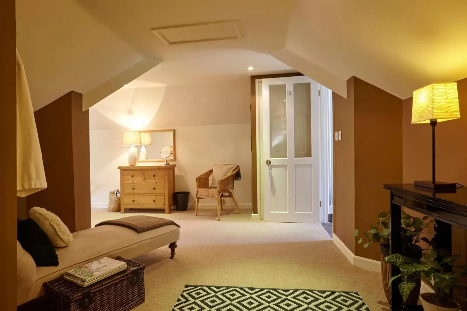 Bedroom, Seating Area in The Den at Backwell Down