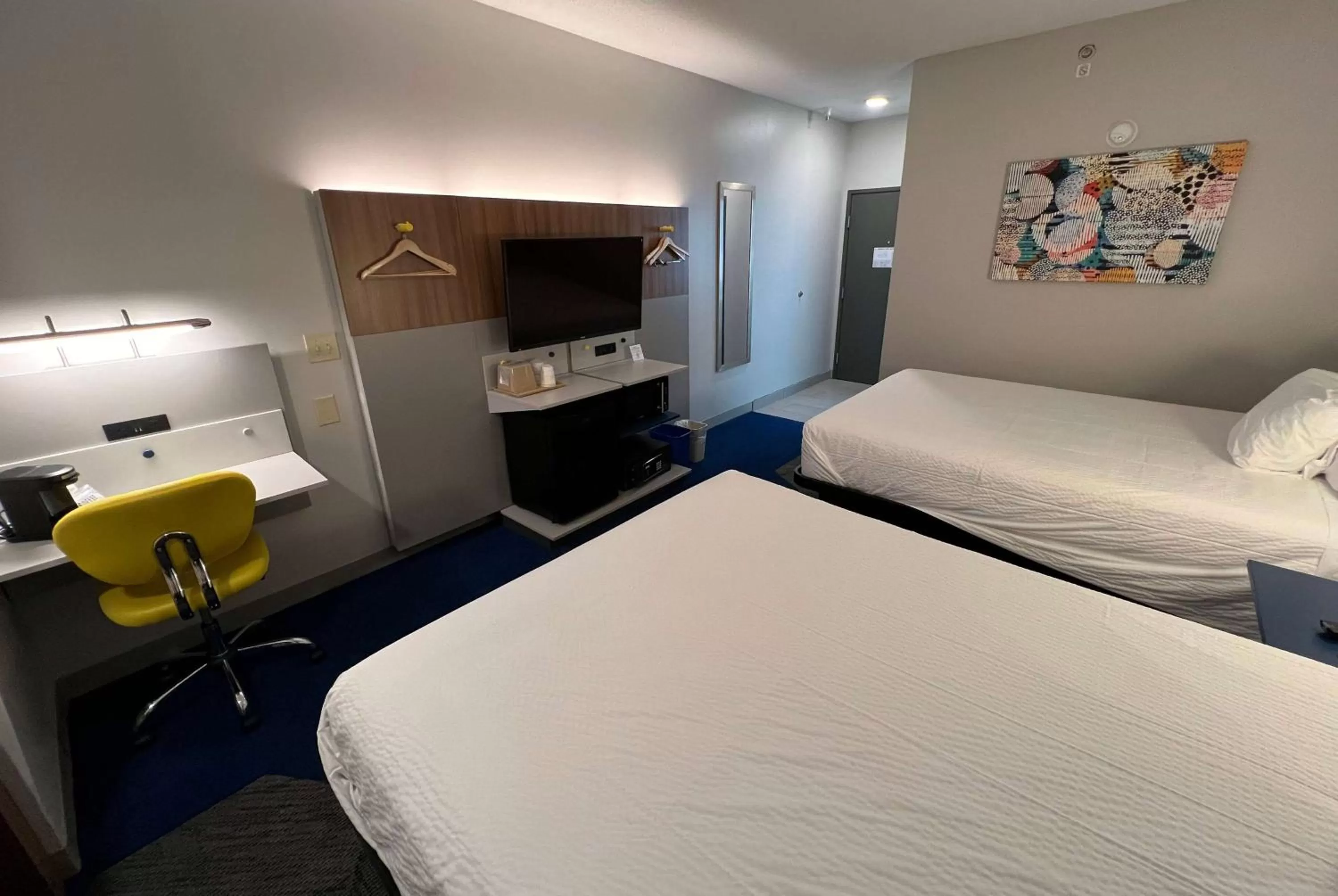 Bed in Microtel Inn & Suites by Wyndham Charlotte/Northlake