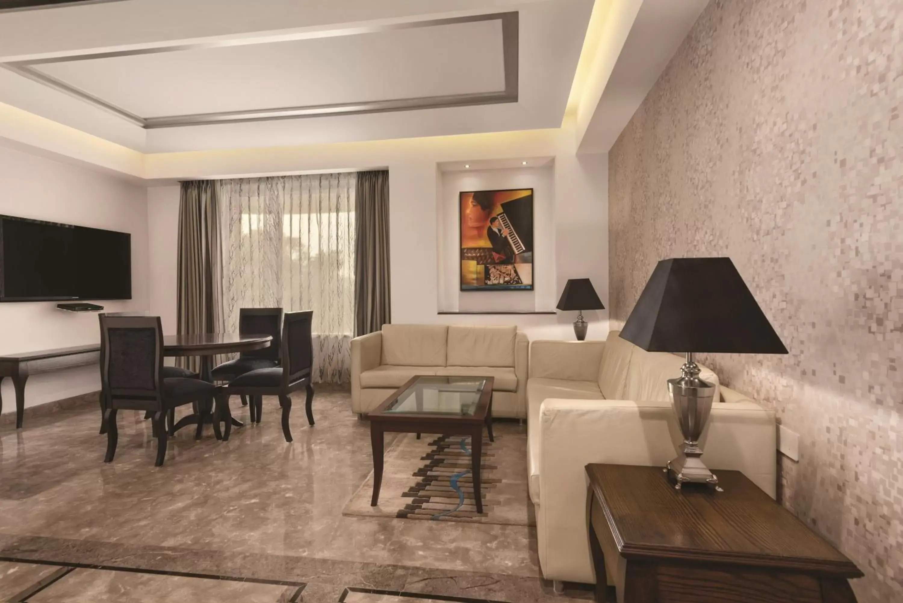 Living room, Lounge/Bar in Ramada by Wyndham Jalandhar City Center