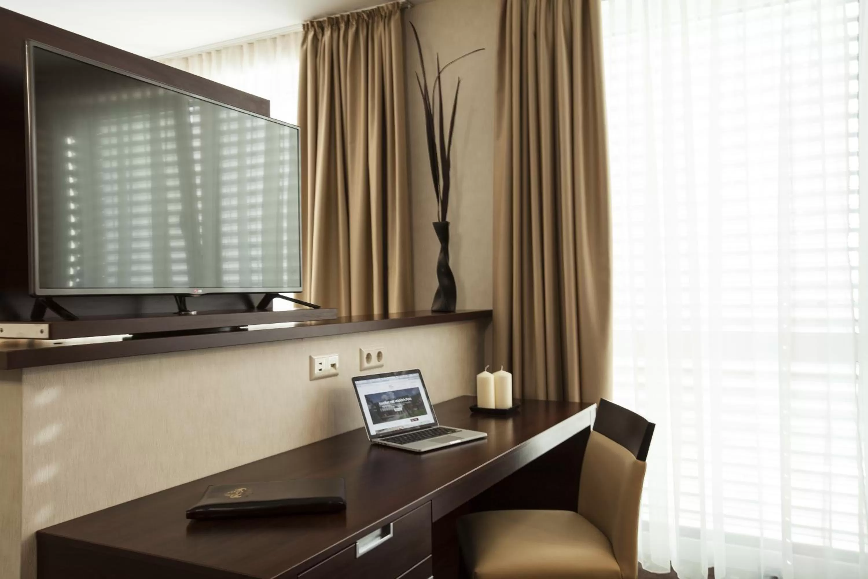 Seating area in Aparthotel DeLuxe