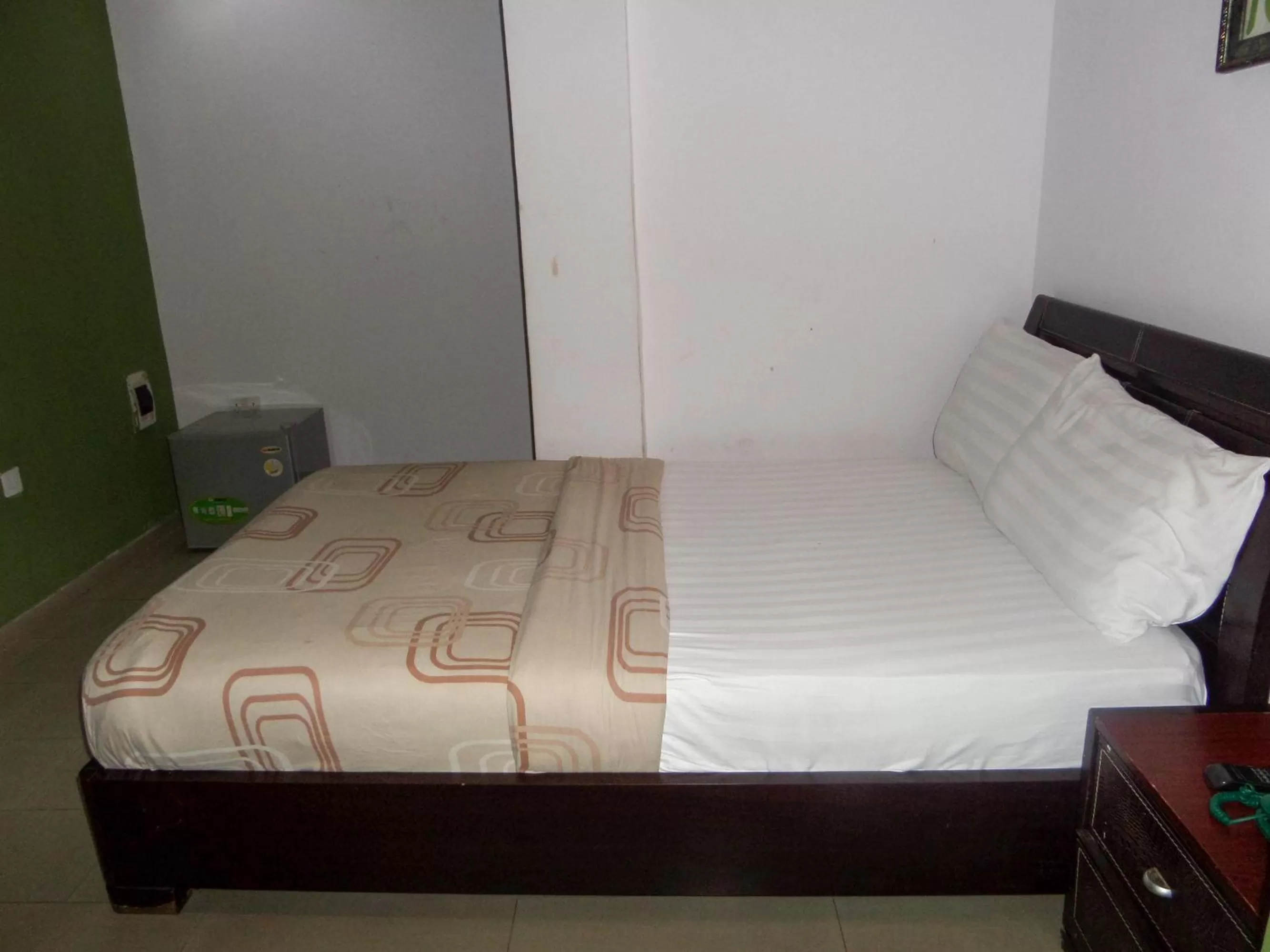 Bed in TheoDawn Hotels @ Suite 29