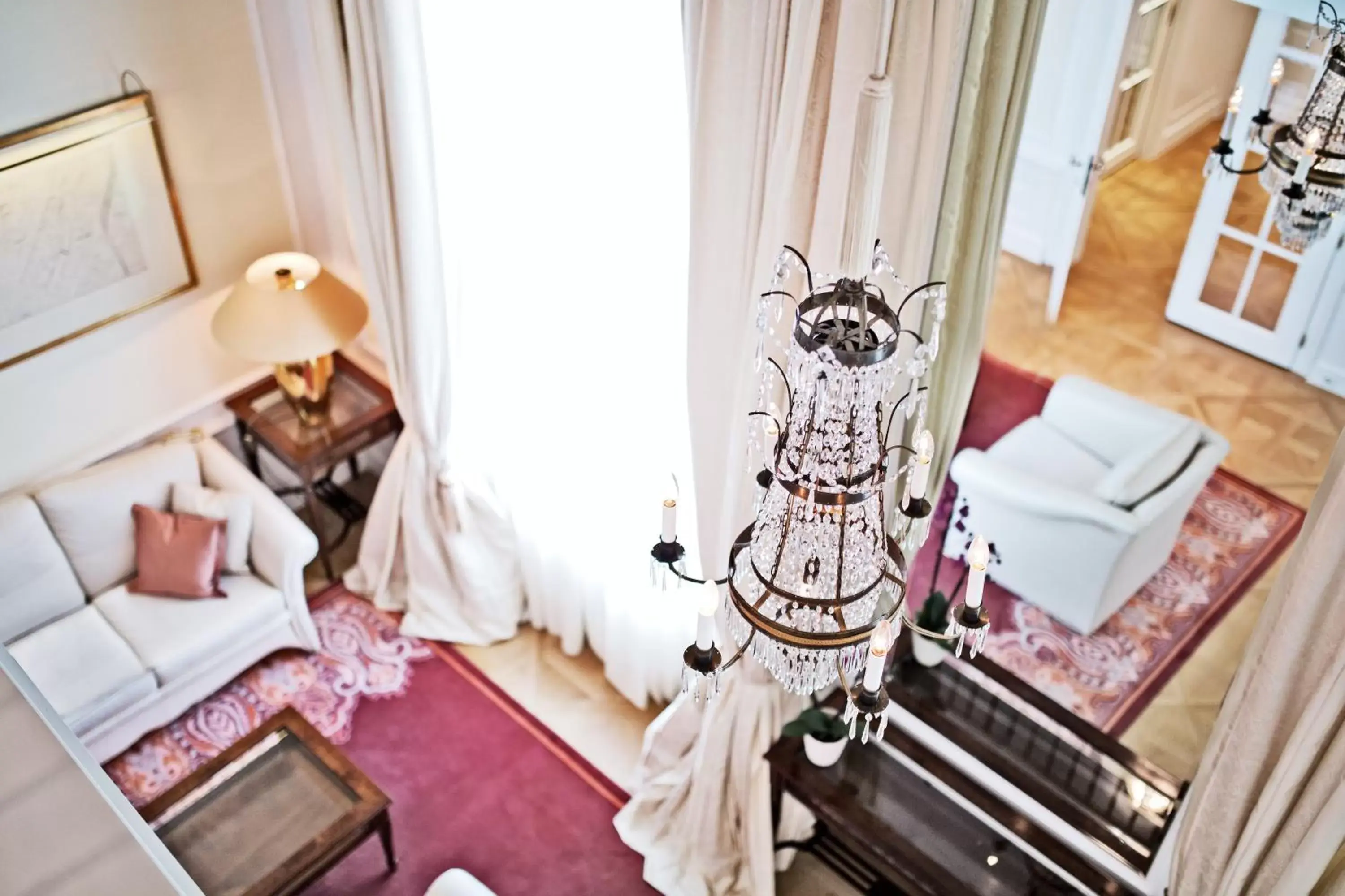 Living room in Palais Coburg Hotel Living room in Palais Coburg Hotel