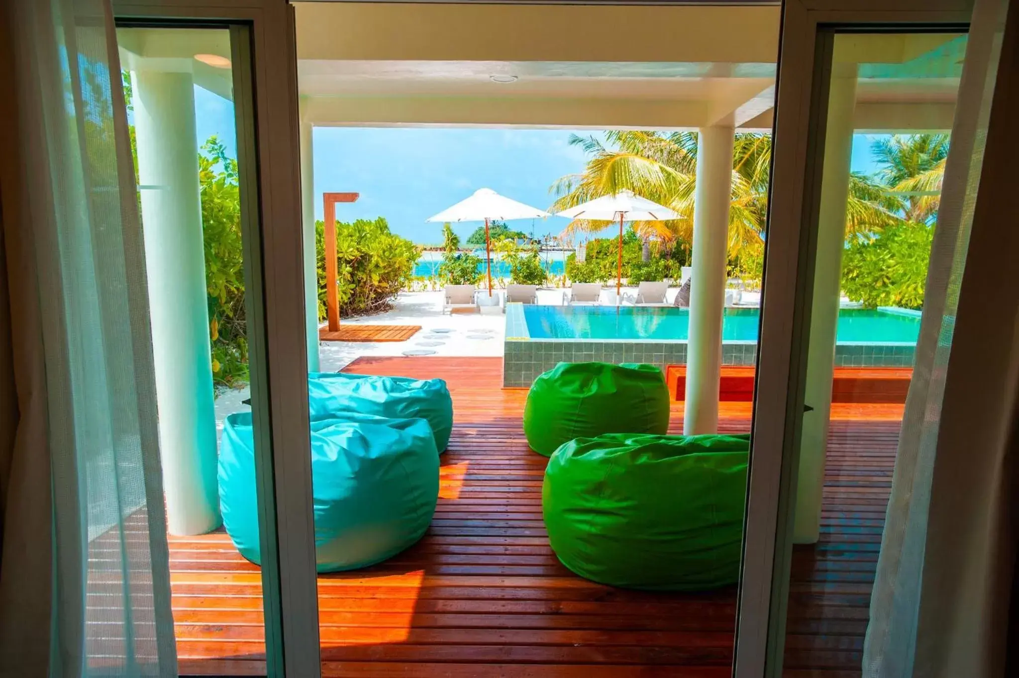 Photo of the whole room, Pool View in Holiday Inn Resort Kandooma Maldives - Kids Stay & Eat Free