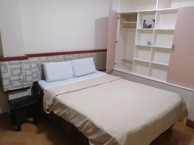 Bed in Manora Apartment