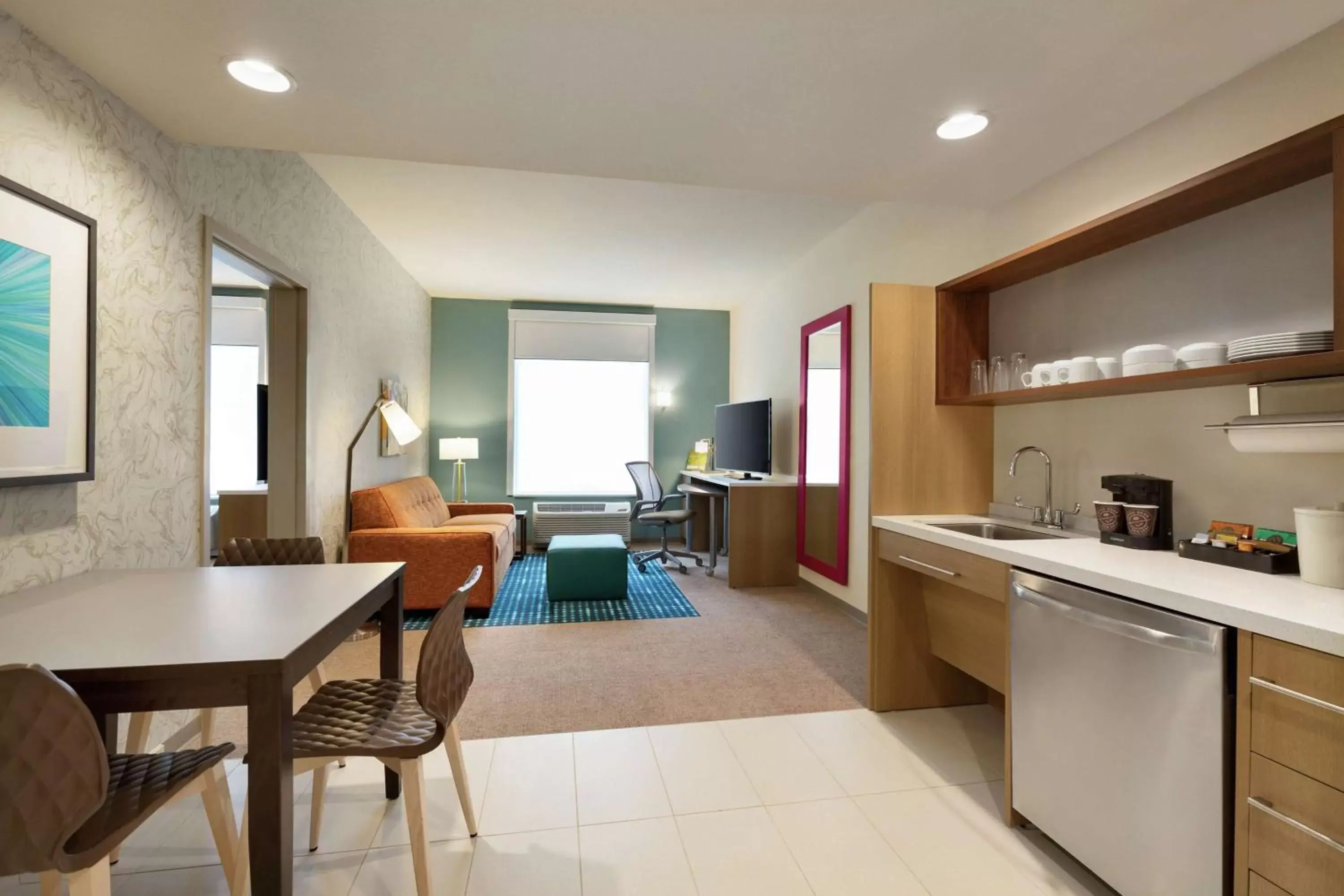 Living room, Kitchen/Kitchenette in Home2 Suites By Hilton Frederick